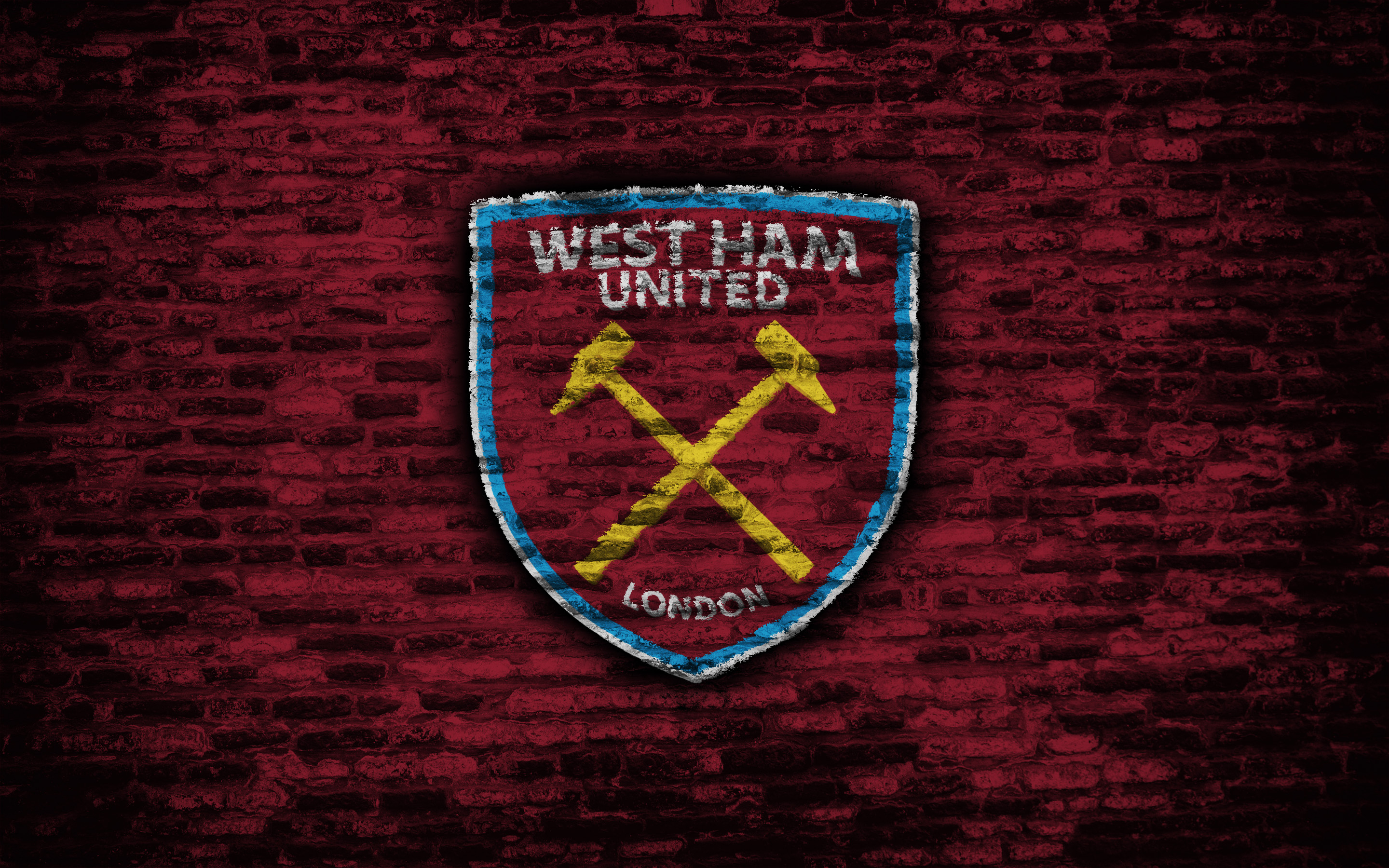 West Ham United F.C. logo on brick wall HD Wallpaper