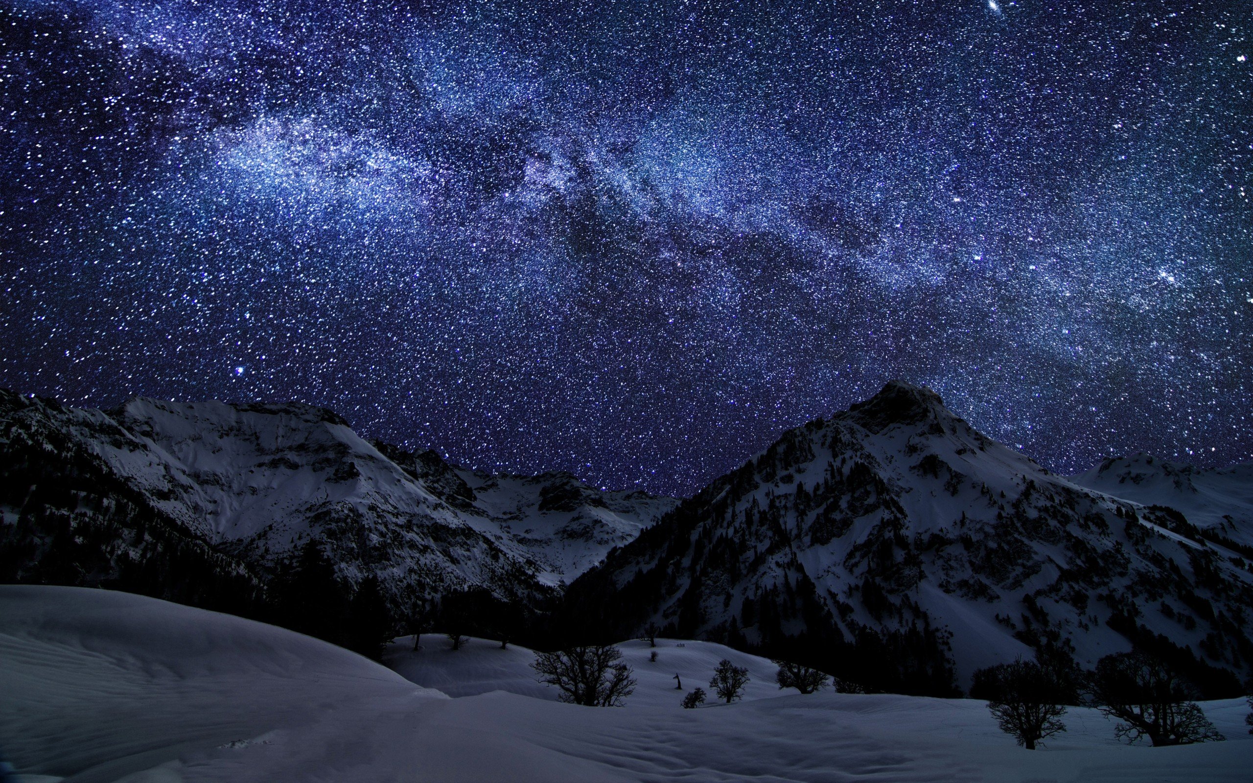 Milky Way over snowy mountains in Bavaria, Germany HD Wallpaper