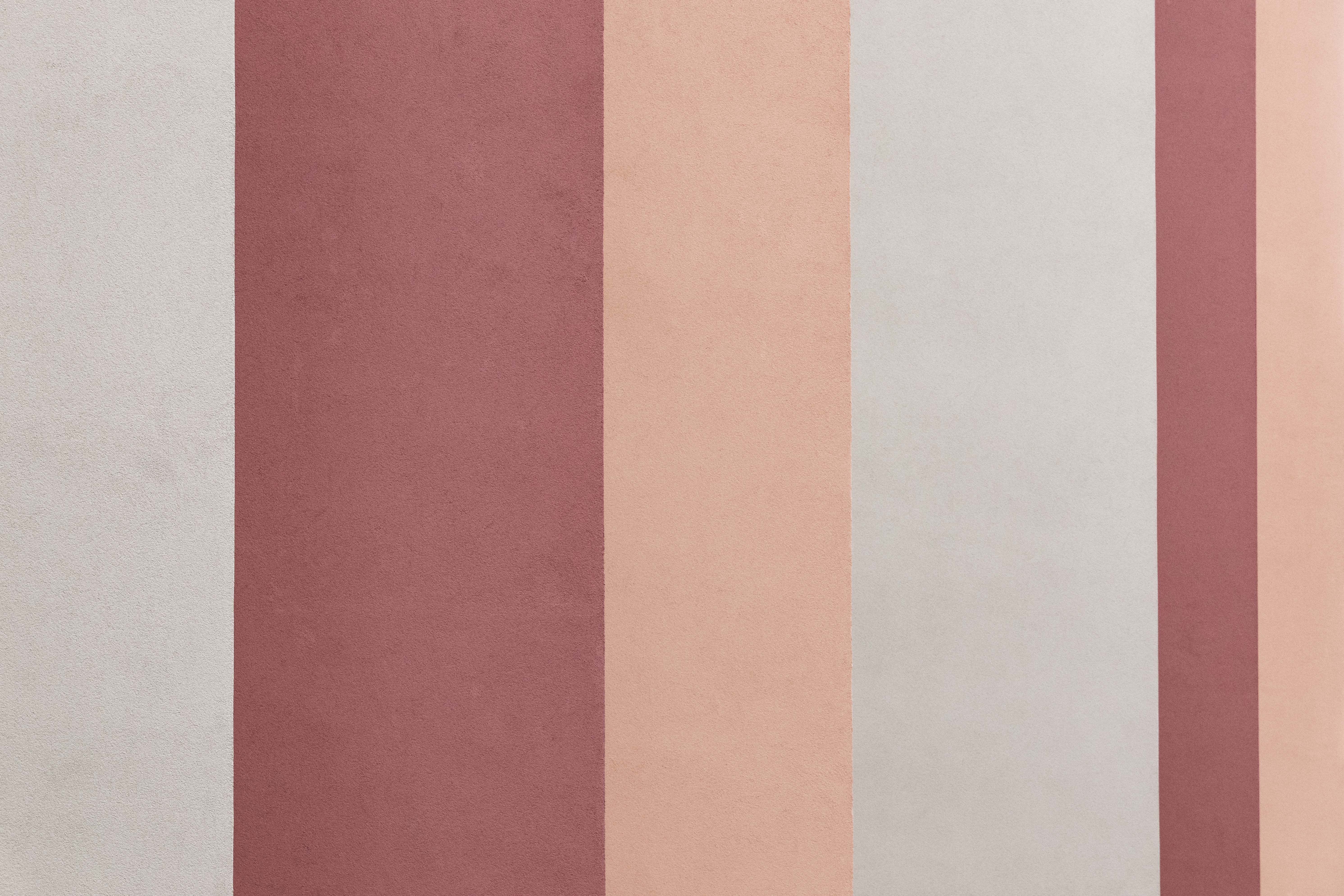 Vertical stripes of pastel colors on a textured surface HD Wallpaper