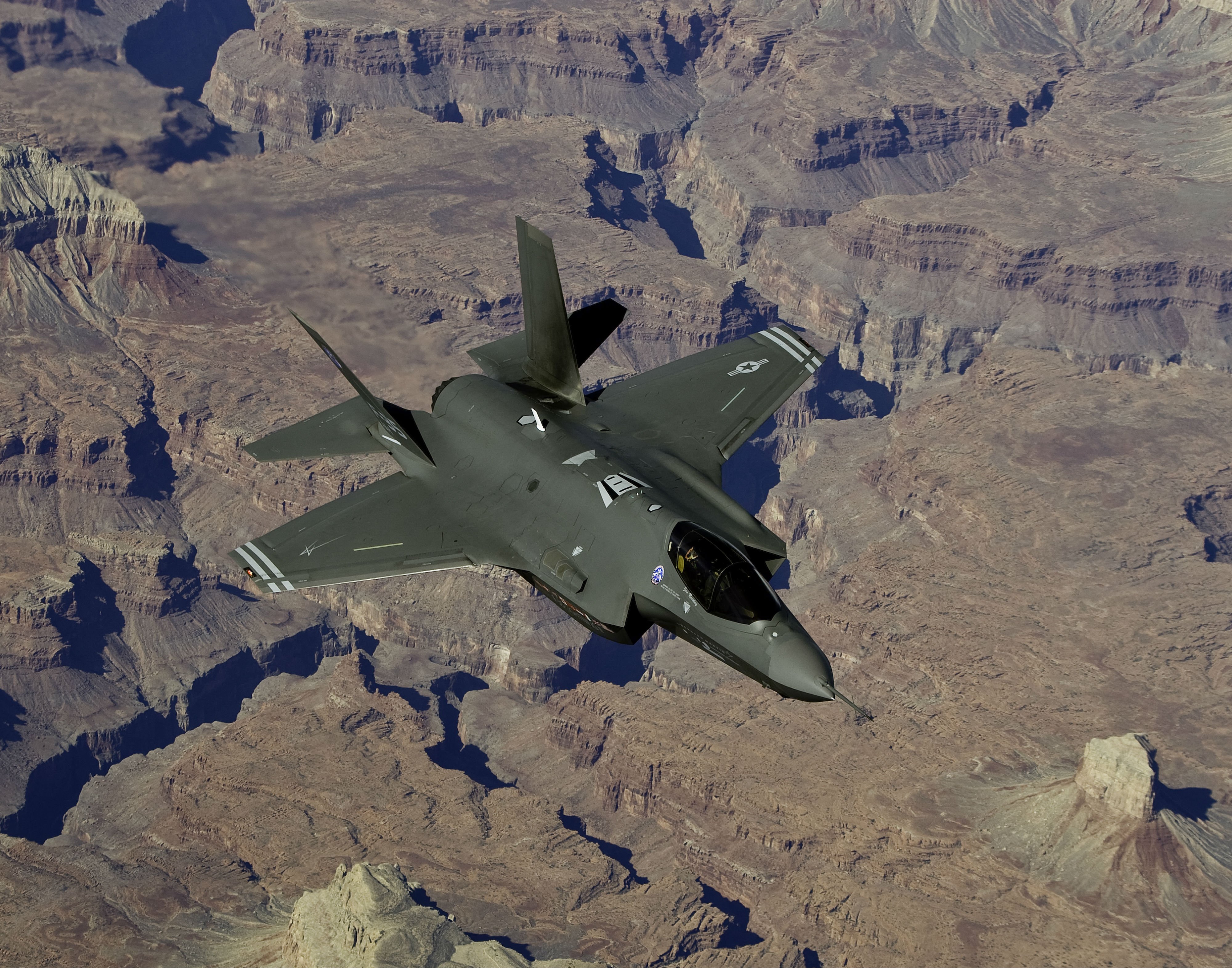 F-35 Joint Strike Fighter flying over Grand Canyon HD Wallpaper