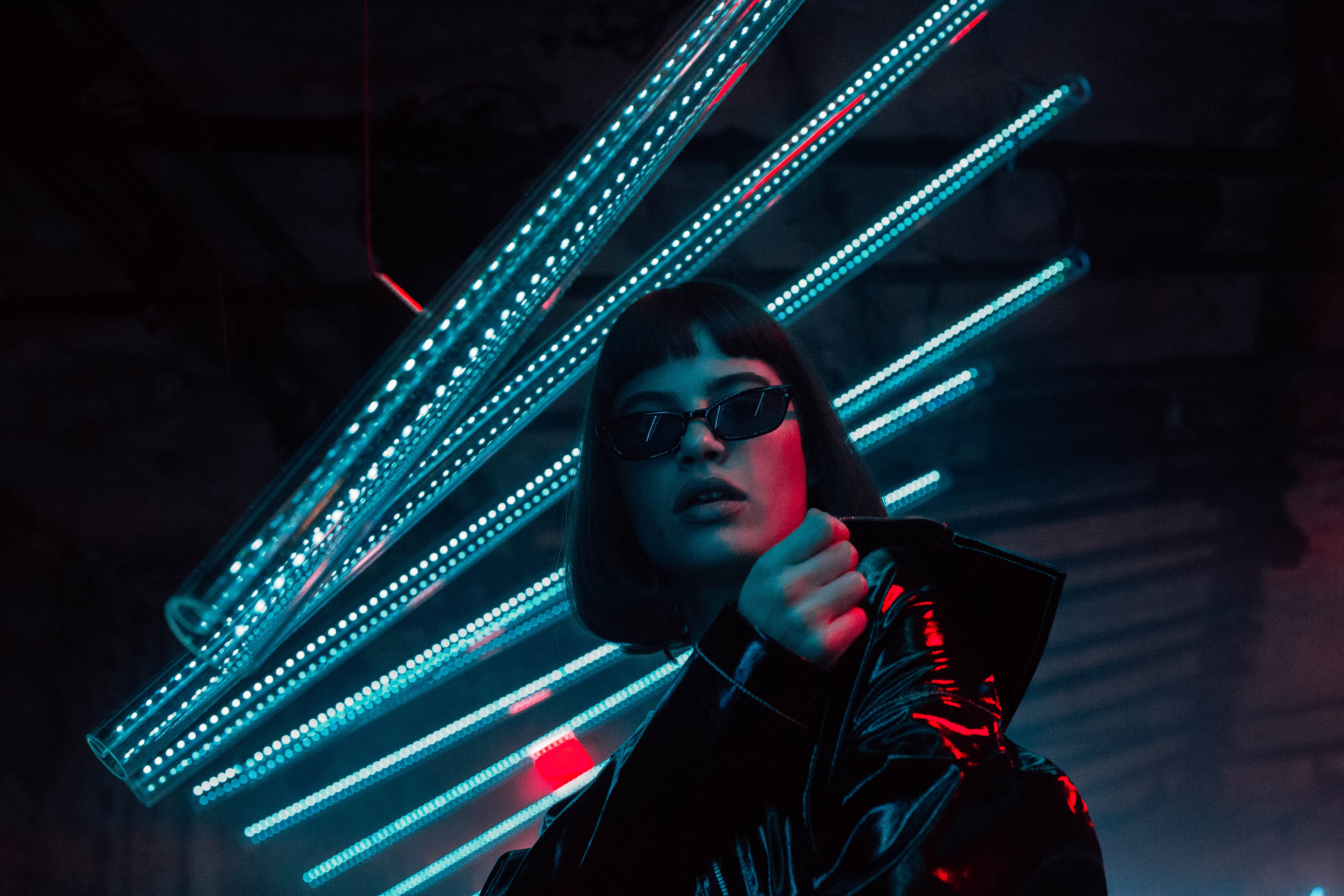 Woman in sunglasses with neon lights HD Wallpaper