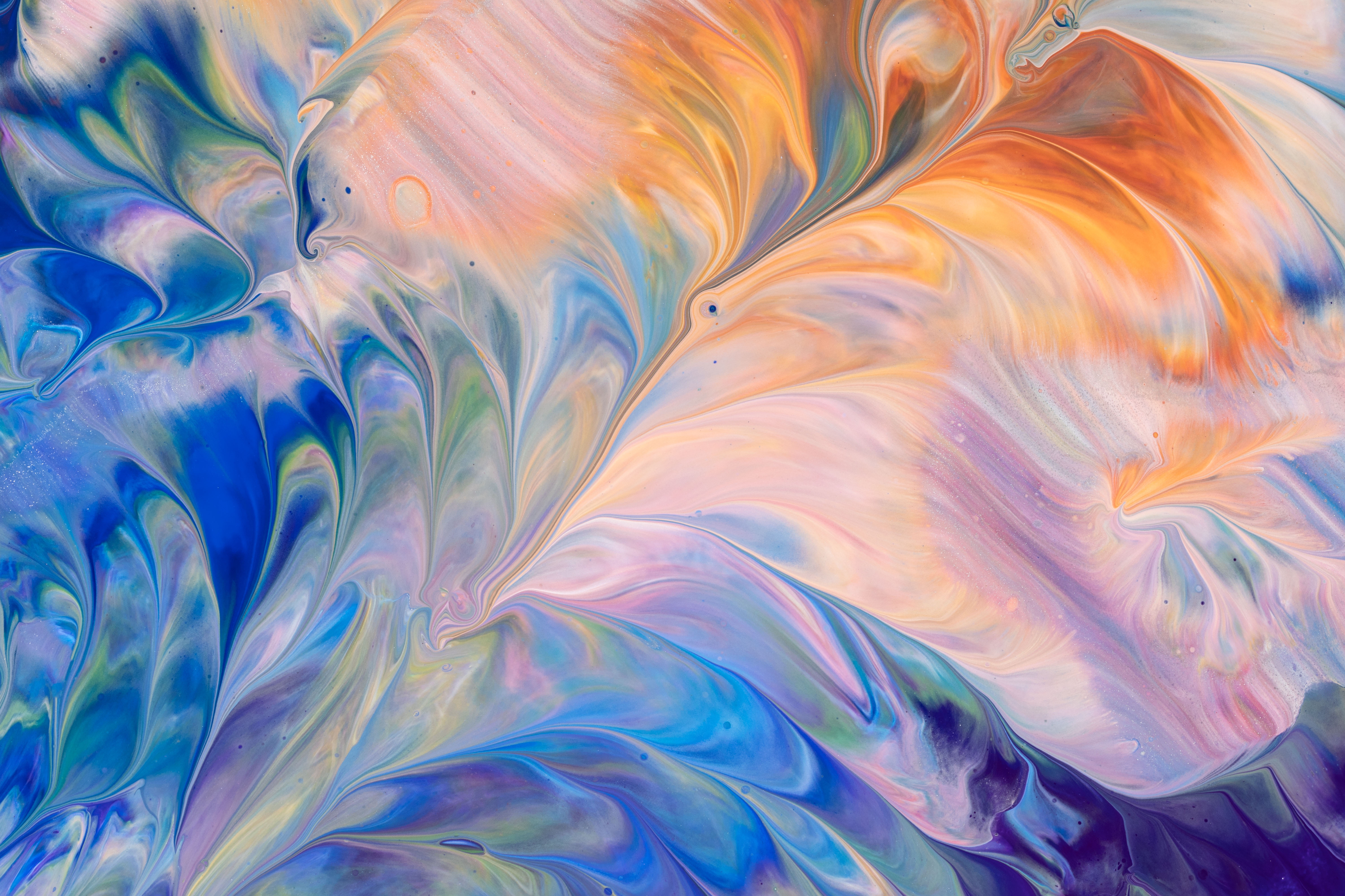 Abstract acrylic paint pour with blue, orange, and purple swirls HD Wallpaper
