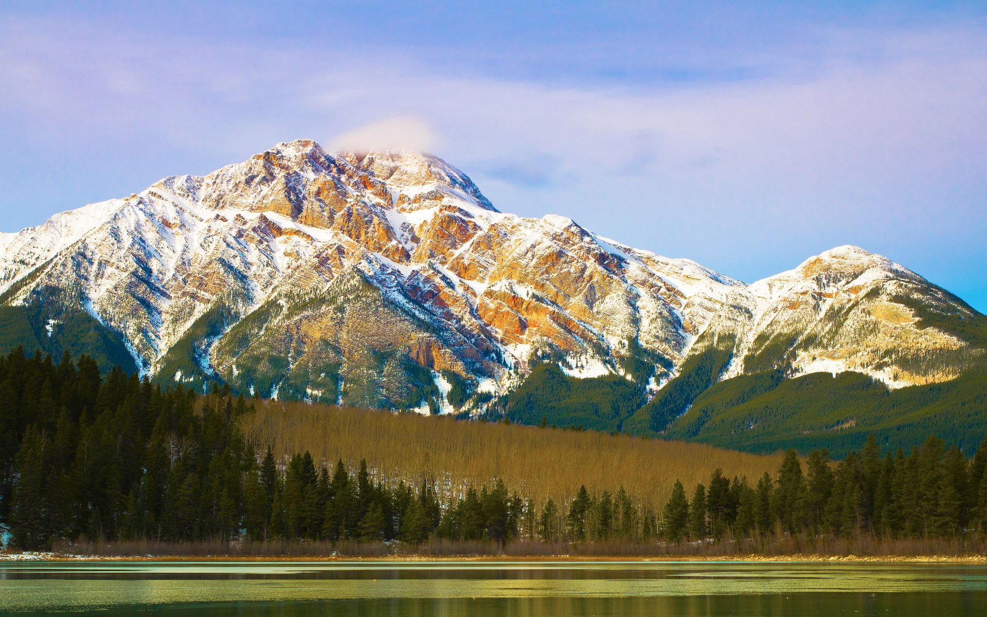 Snow-capped mountains reflected in a lake HD Wallpaper