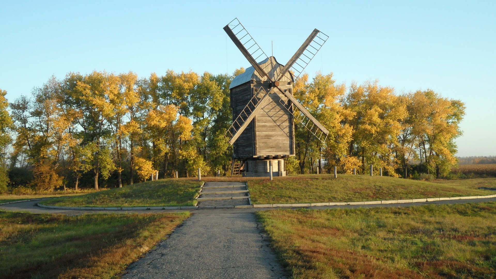 Wooden windmill in autumn landscape HD Wallpaper
