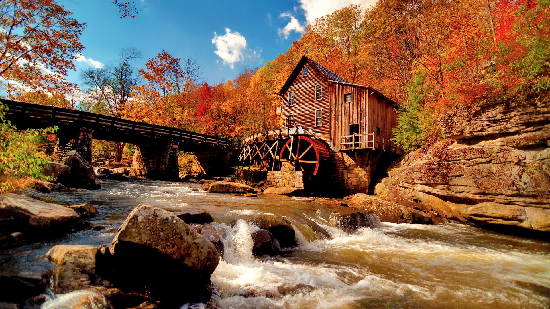 Old mill with water wheel and bridge in autumn HD Wallpaper