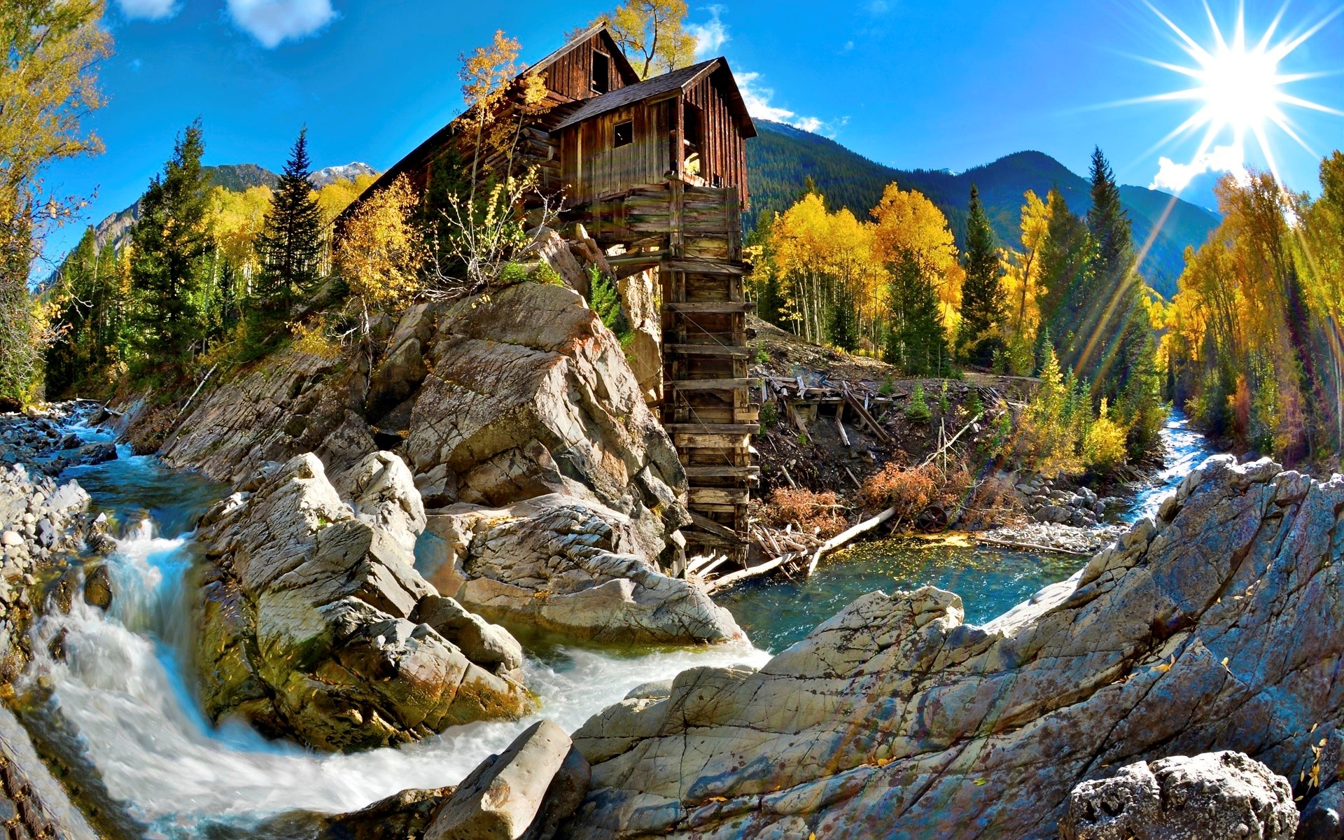 Old wooden mill by a river in autumn HD Wallpaper