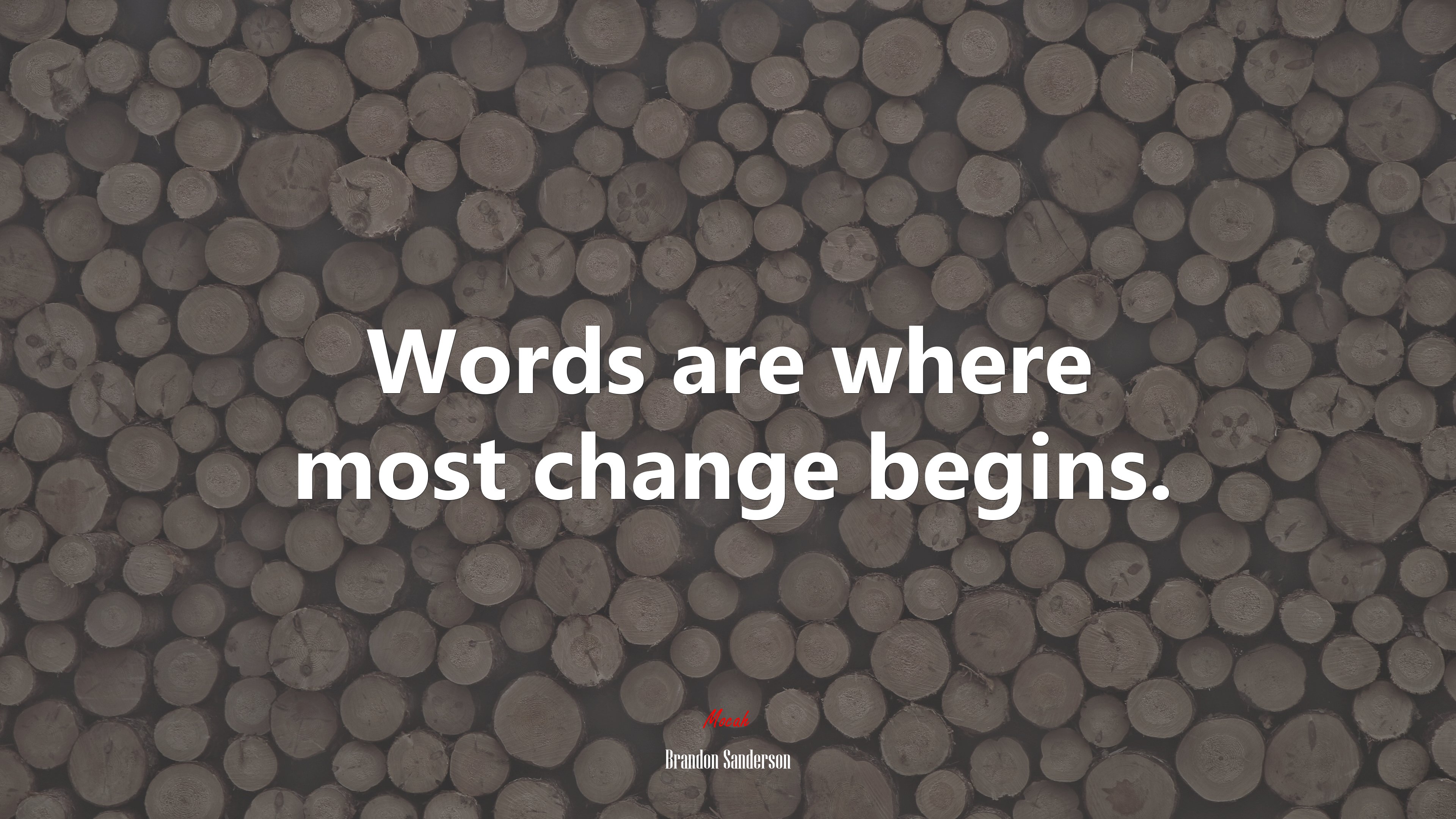 Words are where most change begins. | Brandon Sanderson quote HD Wallpaper