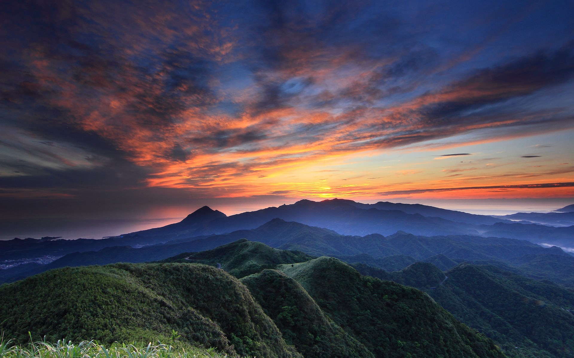 Mountain range at sunrise with colorful clouds HD Wallpaper