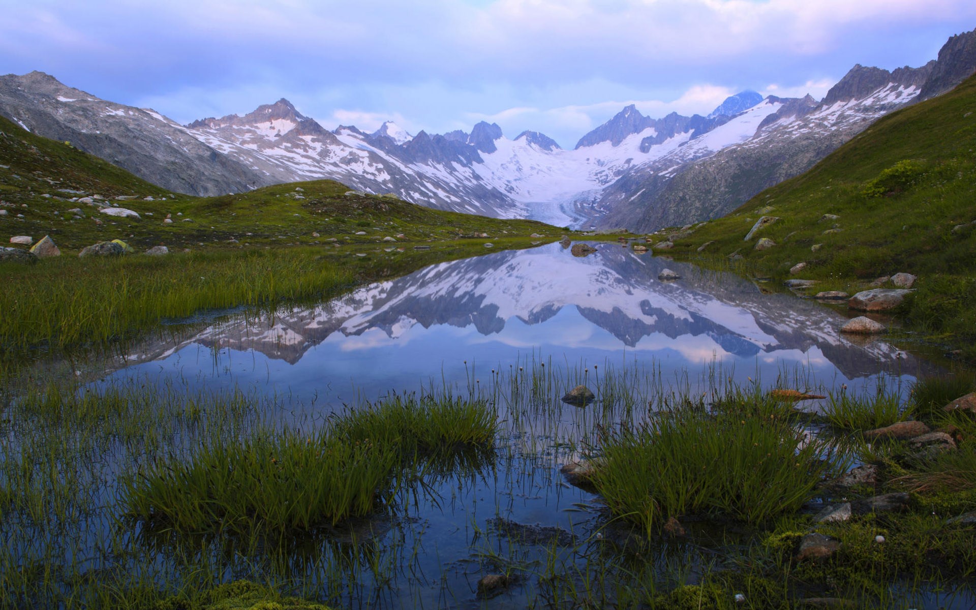 Mountain lake reflection of snowy peaks HD Wallpaper
