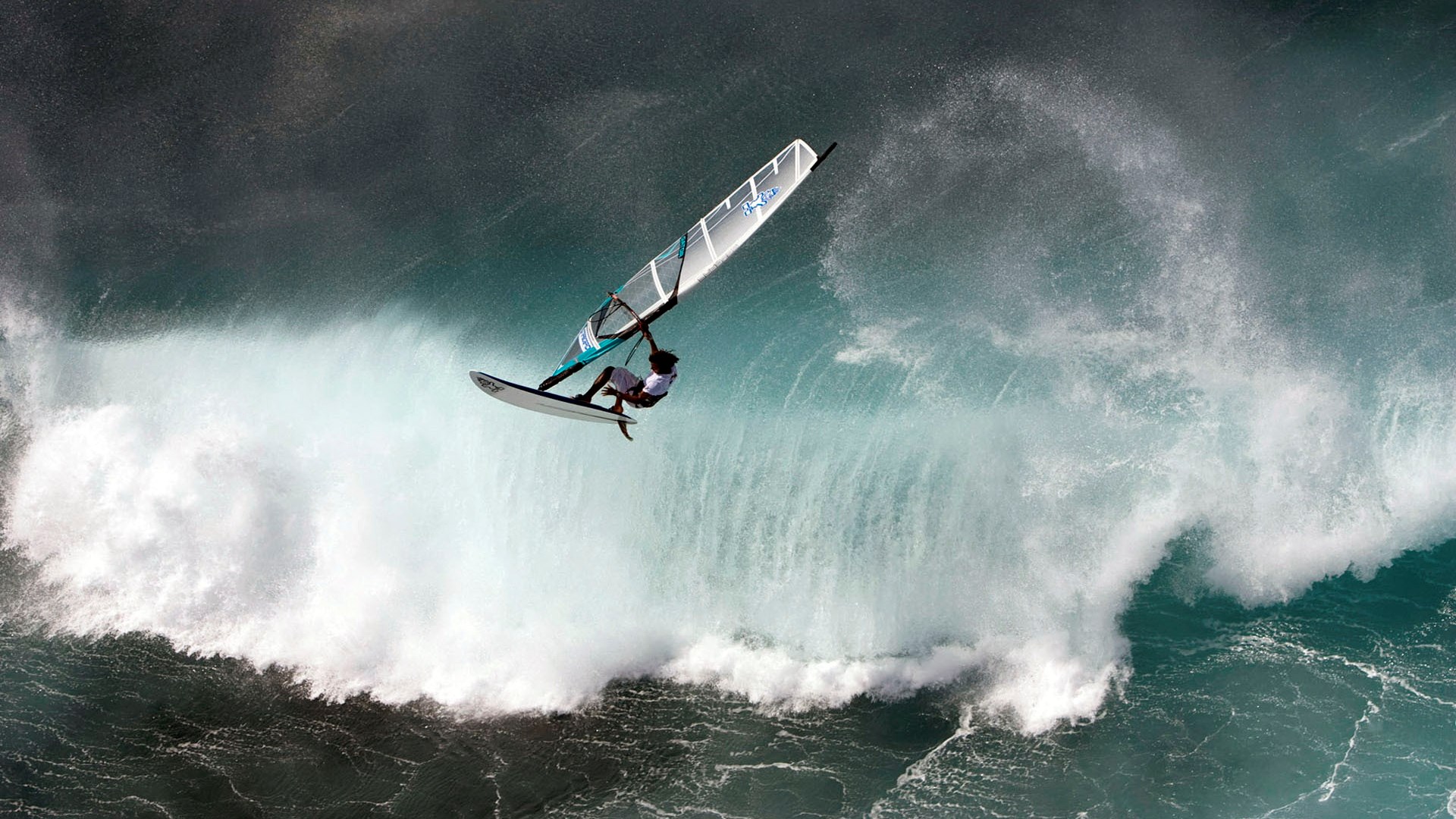 Windsurfer jumps a large wave HD Wallpaper
