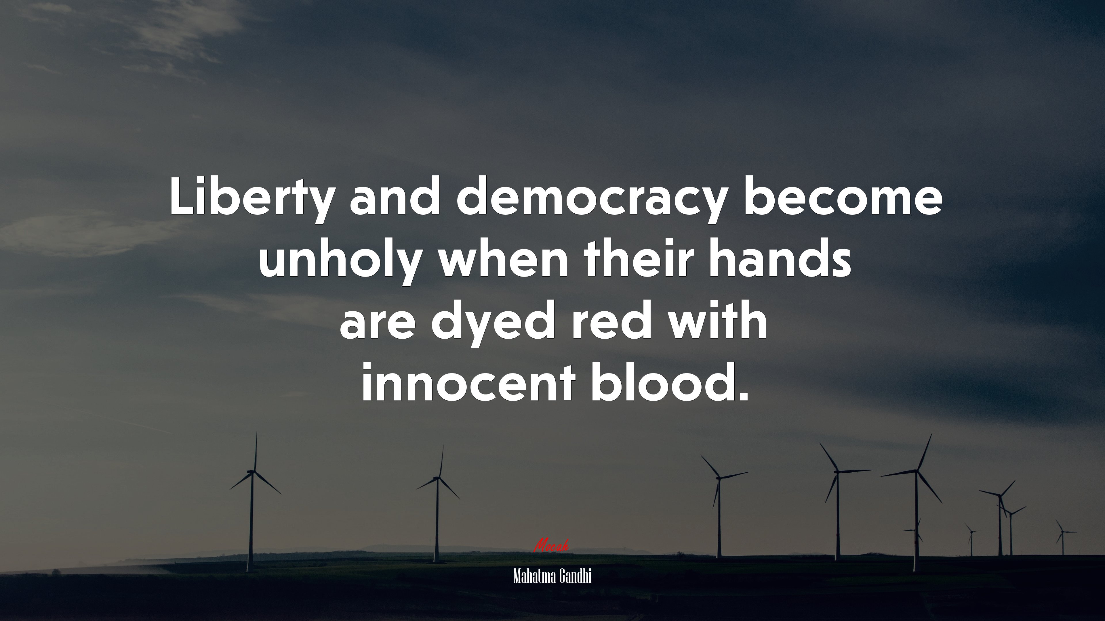 Liberty and democracy become unholy when their hands are dyed red with innocent blood. | Mahatma Gandhi quote HD Wallpaper