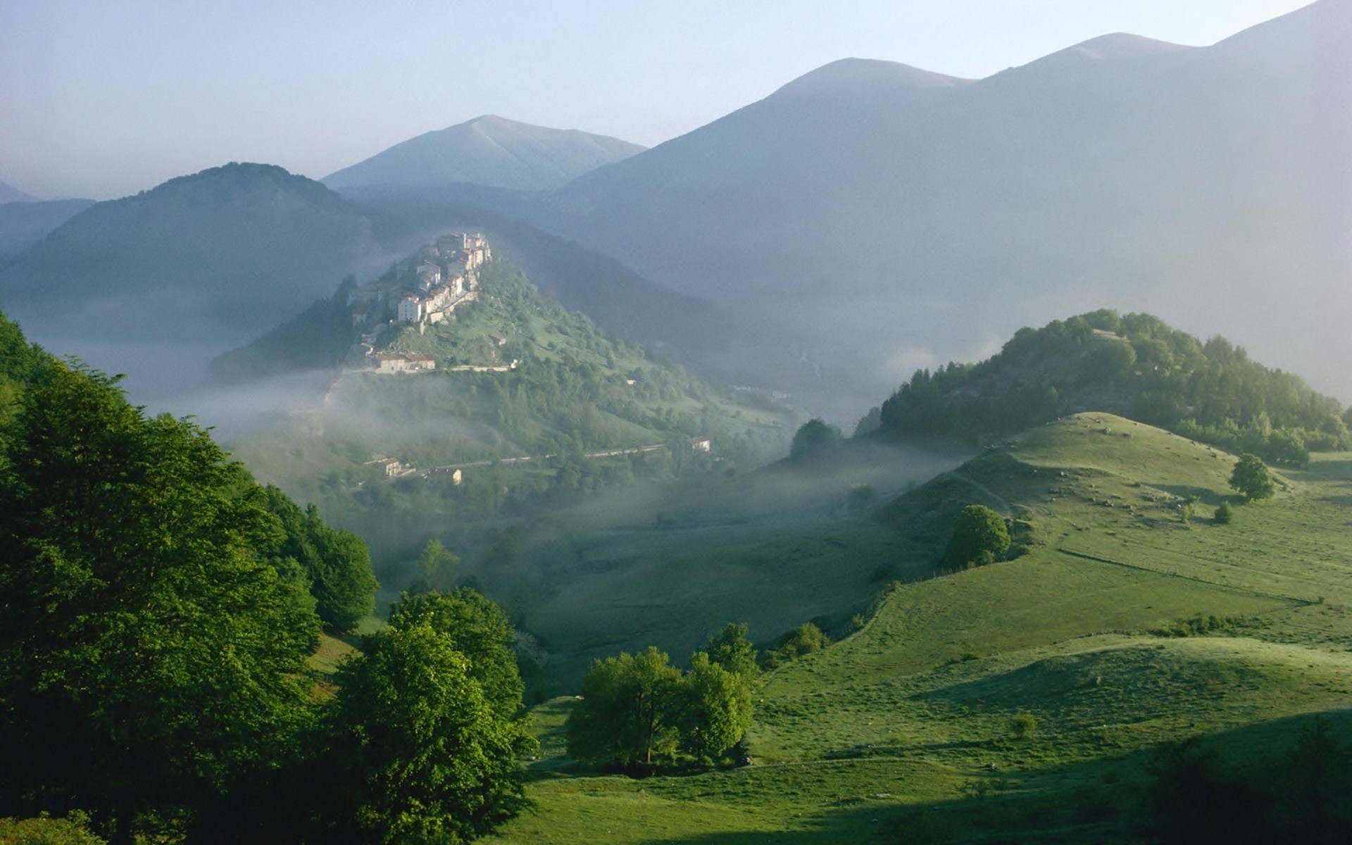 Mountain village in the fog HD Wallpaper