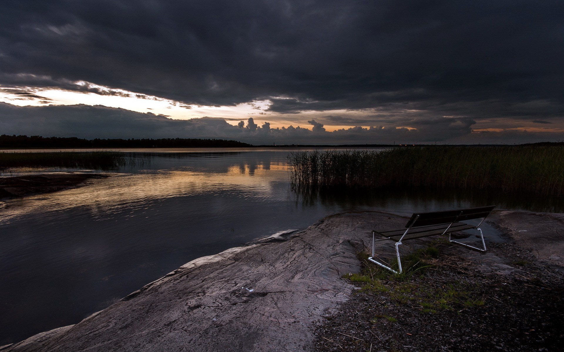 Bench by a lake at sunset HD Wallpaper