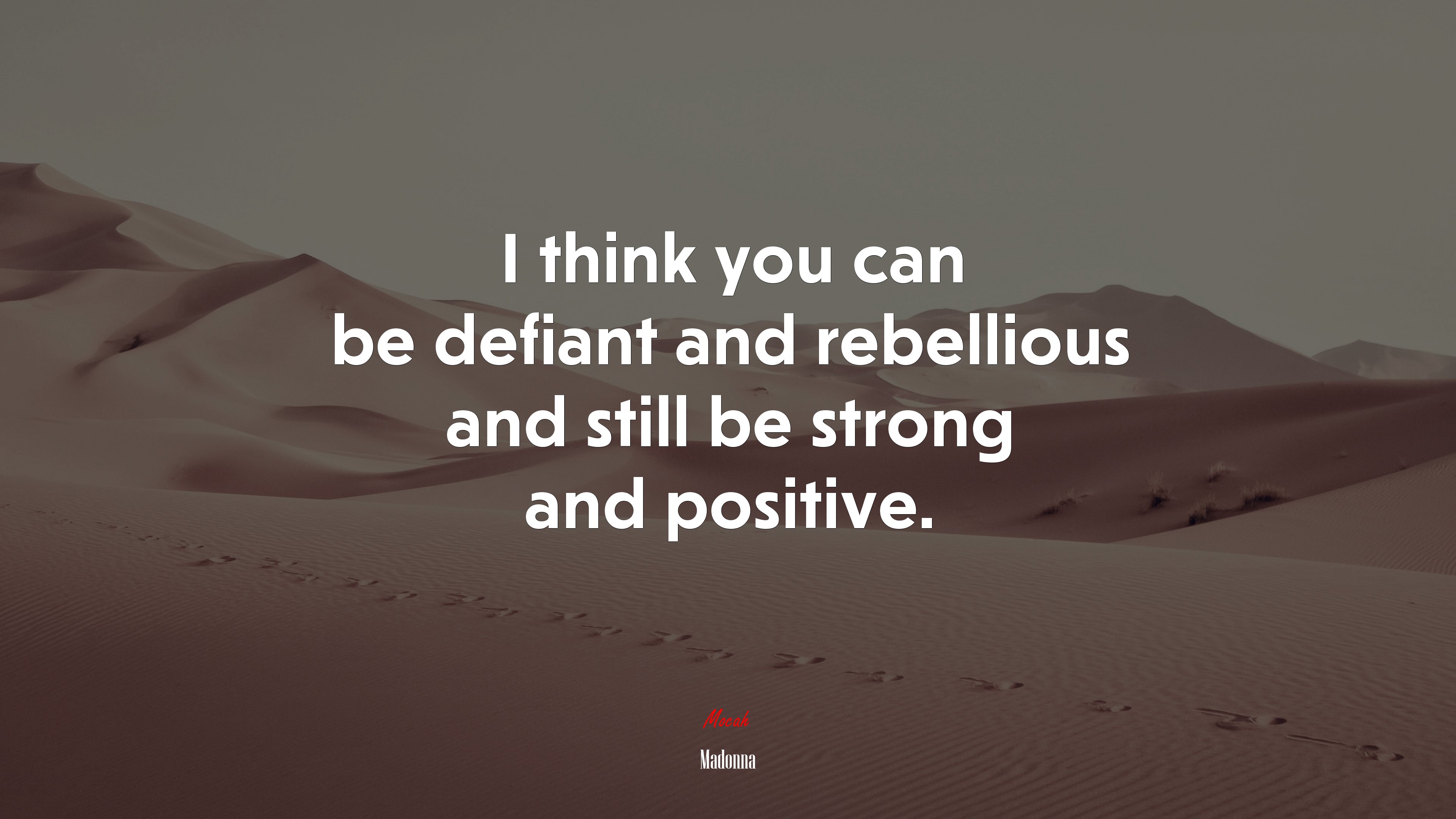 I think you can be defiant and rebellious and still be strong and positive. | Madonna quote HD Wallpaper