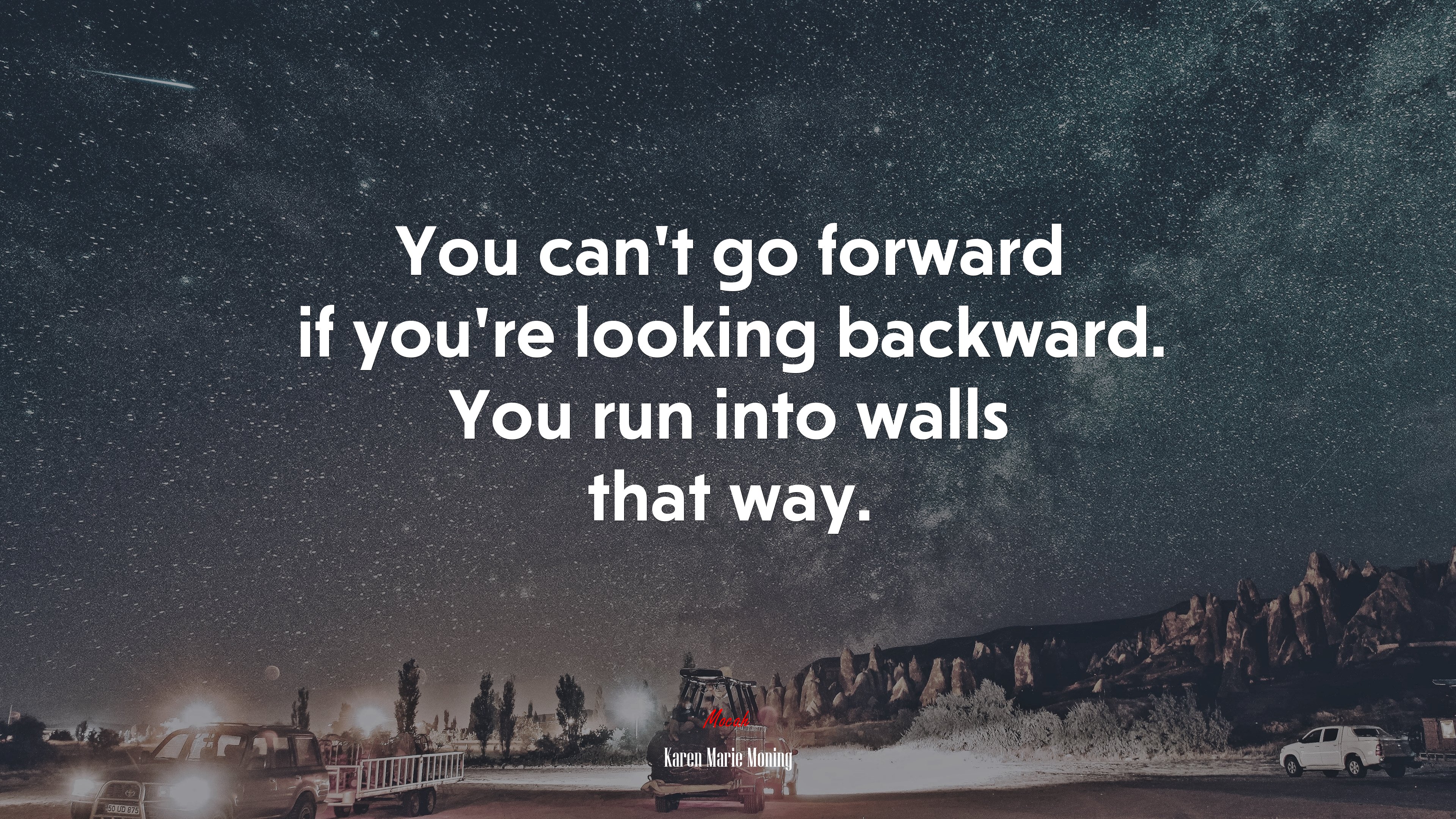 You can’t go forward if you’re looking backward. You run into walls that way. | Karen Marie Moning quote HD Wallpaper
