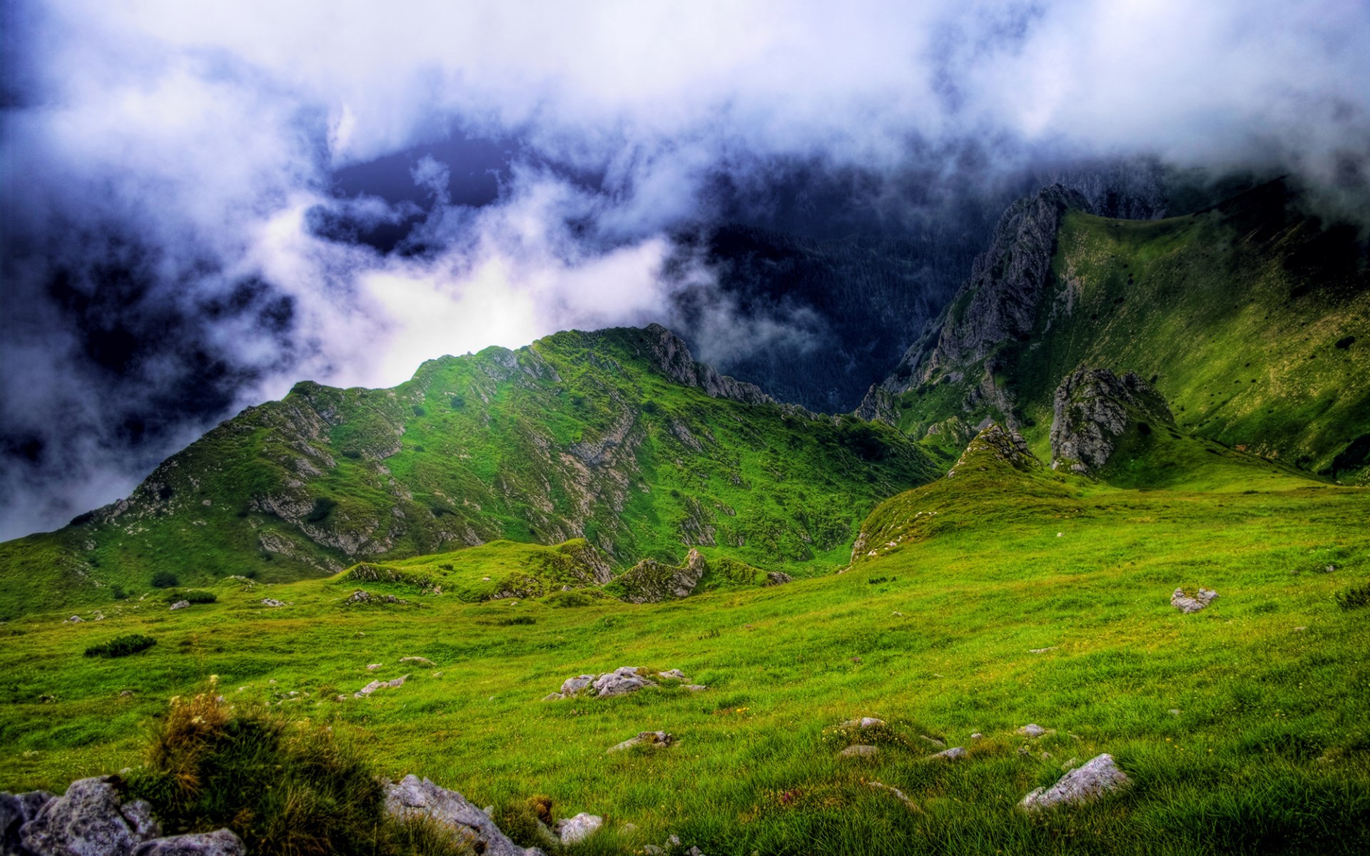 Green mountains with dramatic clouds HD Wallpaper
