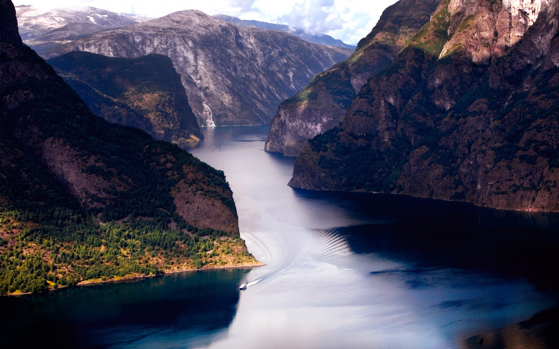 Boat on a Fjord between Mountains HD Wallpaper