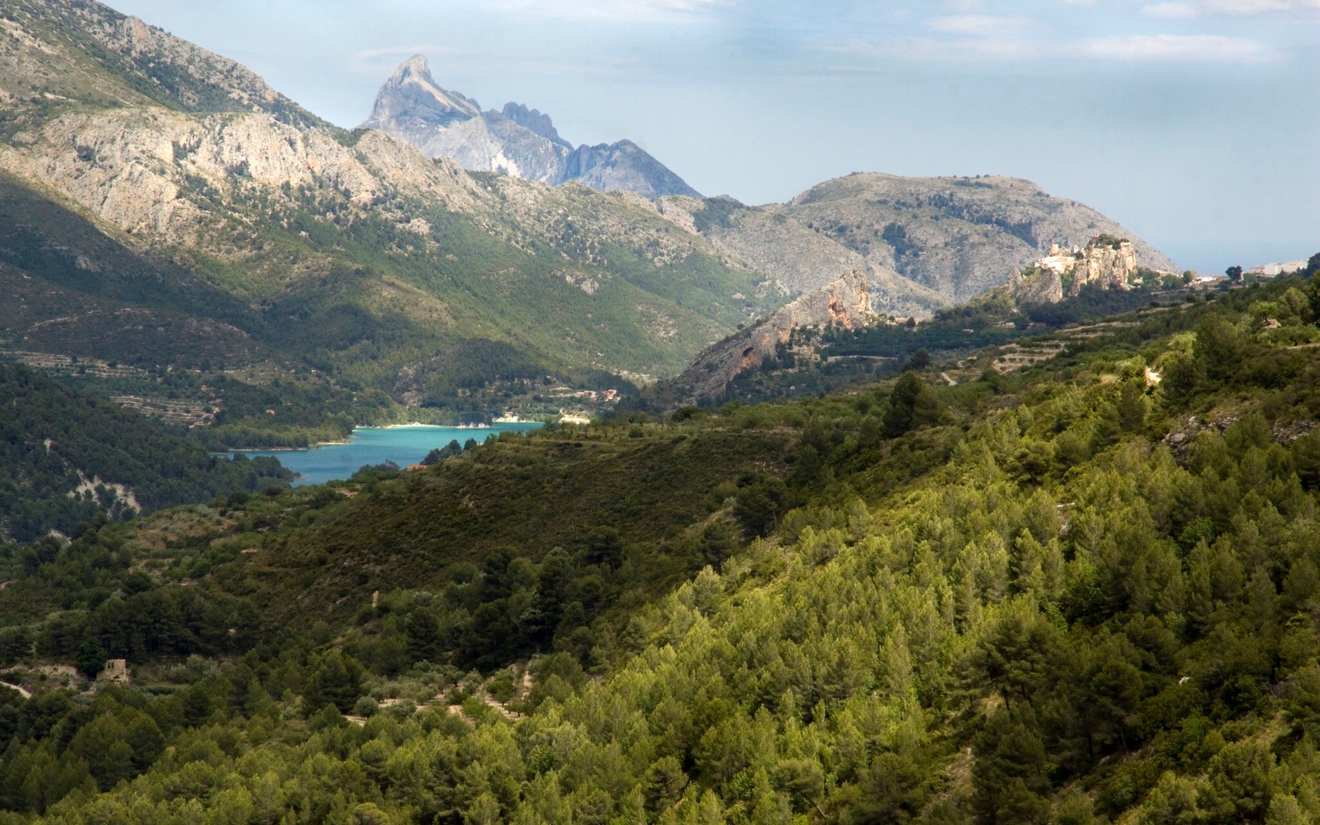Mountain valley with a lake and a village HD Wallpaper