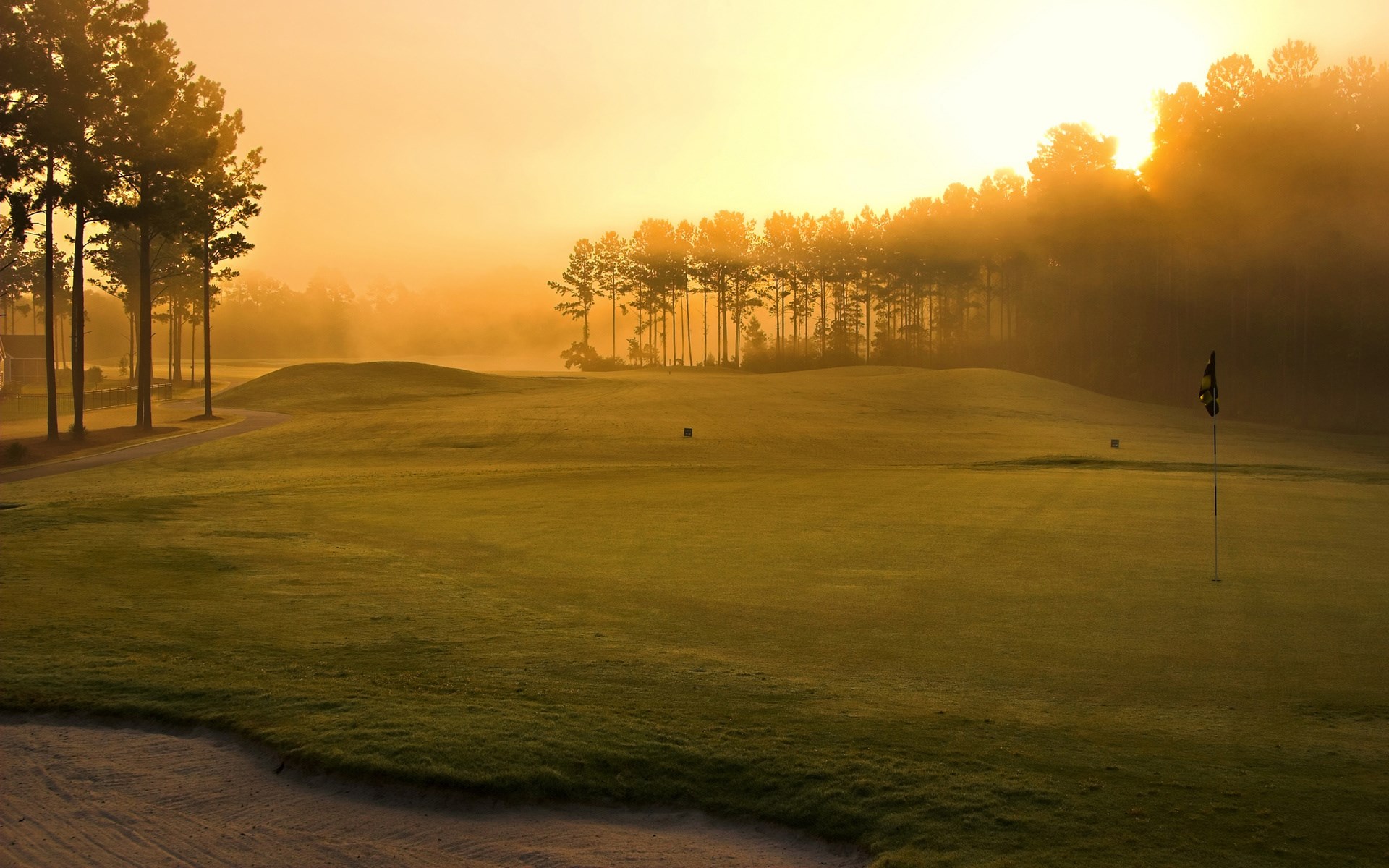 Golf course at sunrise with fog HD Wallpaper