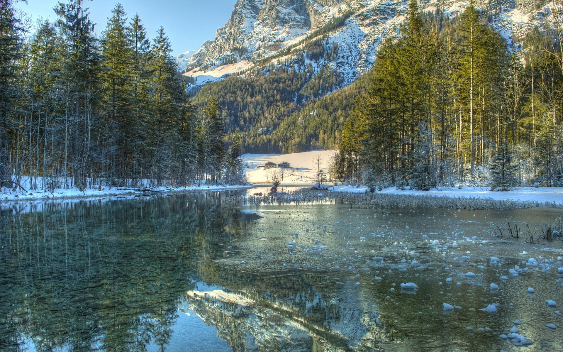 Winter lake reflection with snow-covered mountains and forest HD Wallpaper