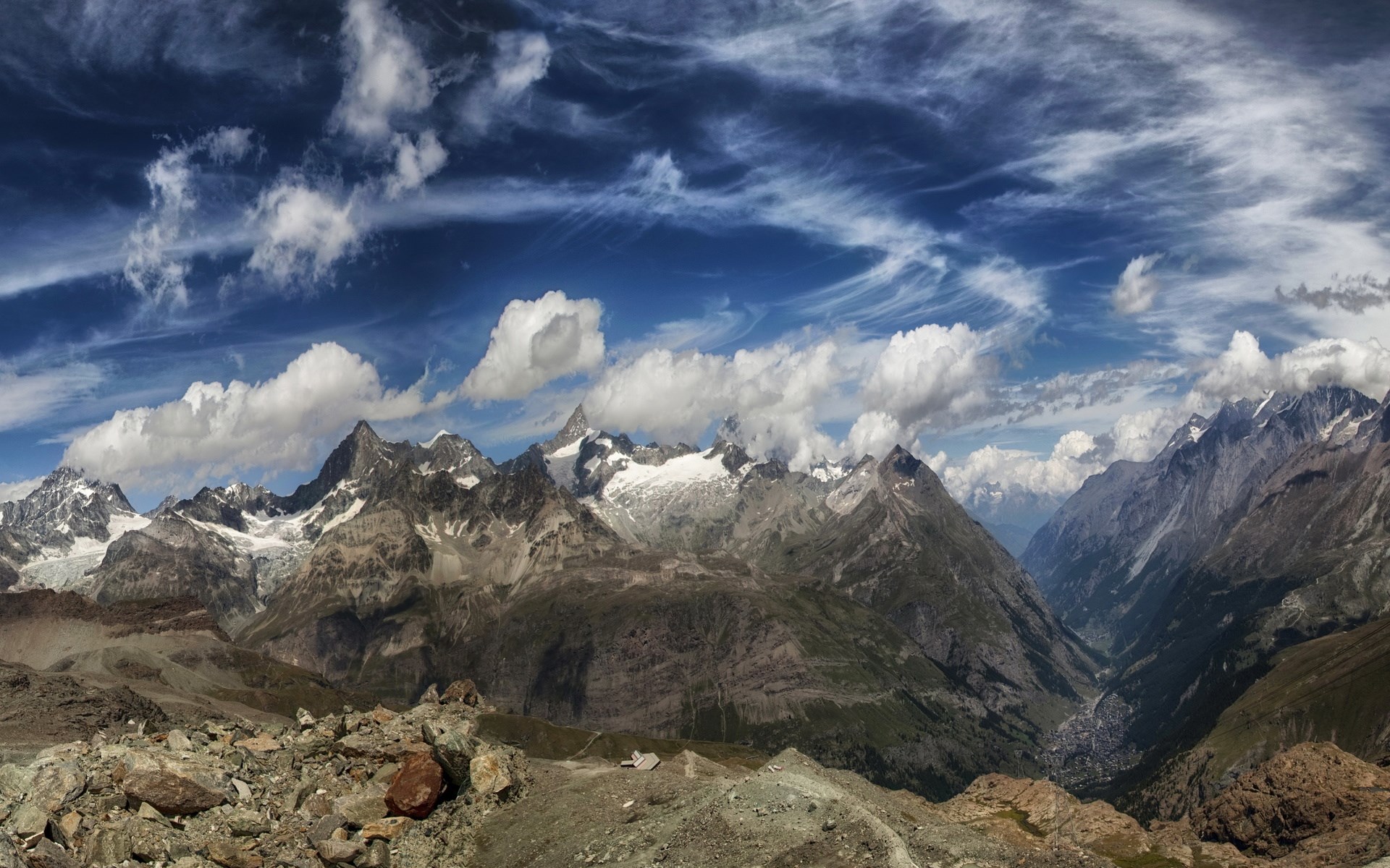Panoramic view of rocky mountains and a valley HD Wallpaper
