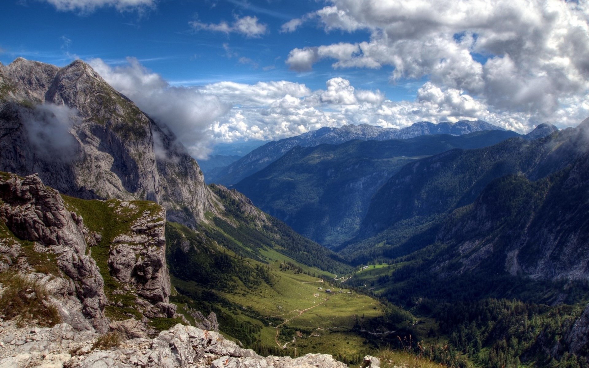 Mountain valley with clouds and blue sky HD Wallpaper