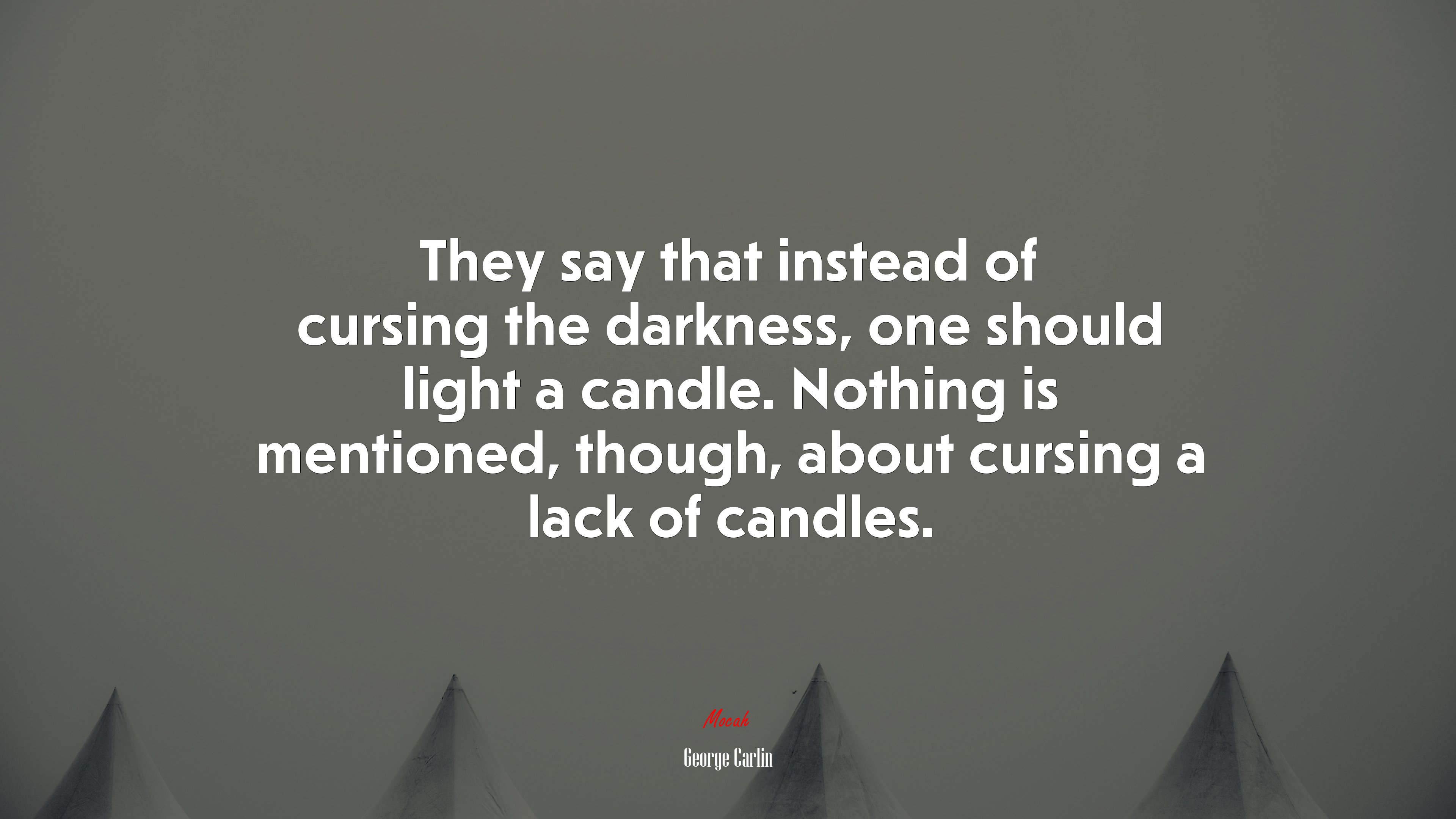 They say that instead of cursing the darkness, one should light a candle. Nothing is mentioned, though, about cursing a lack of candles. | George Carlin quote HD Wallpaper