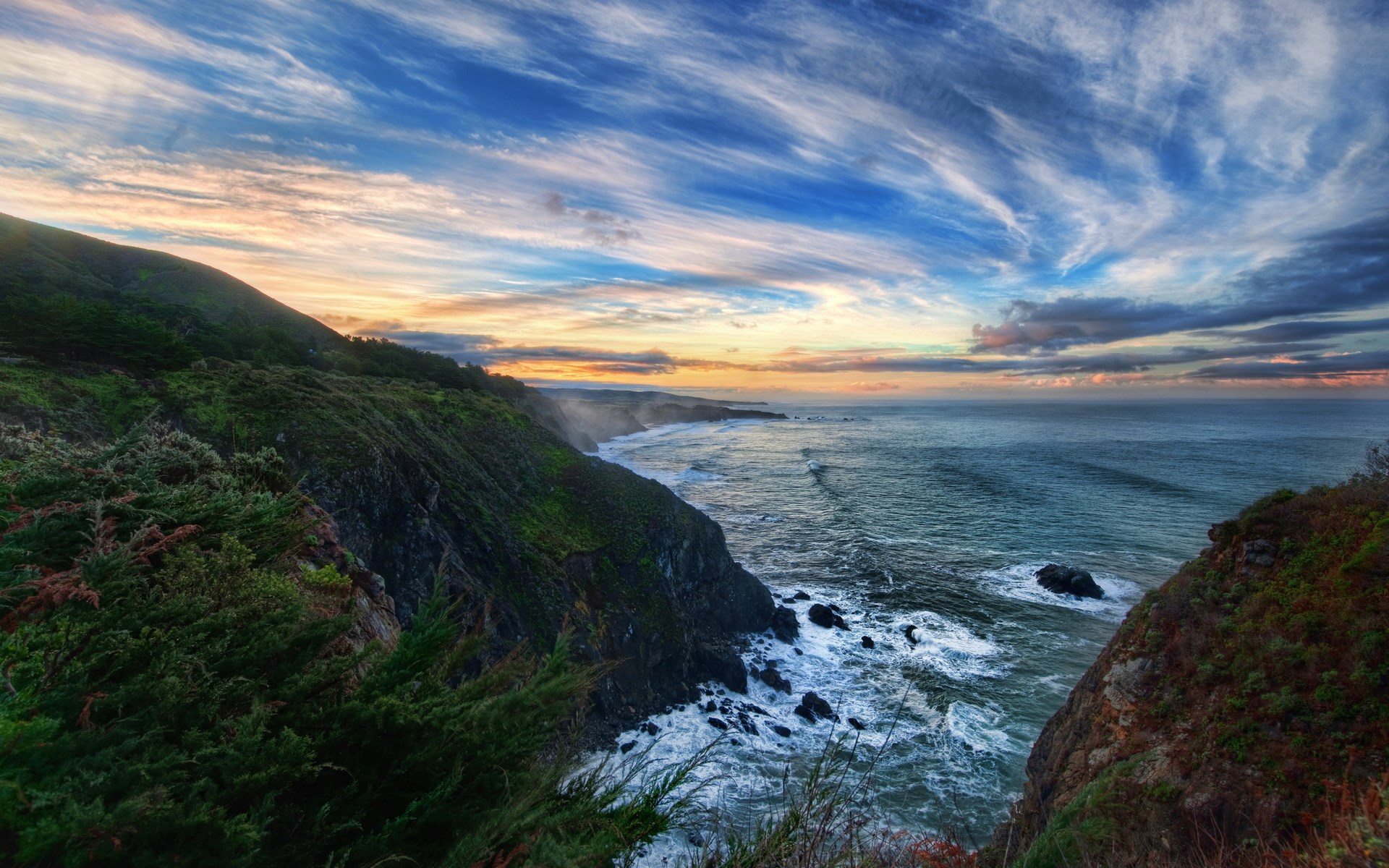Coastal cliffs and ocean at sunset HD Wallpaper