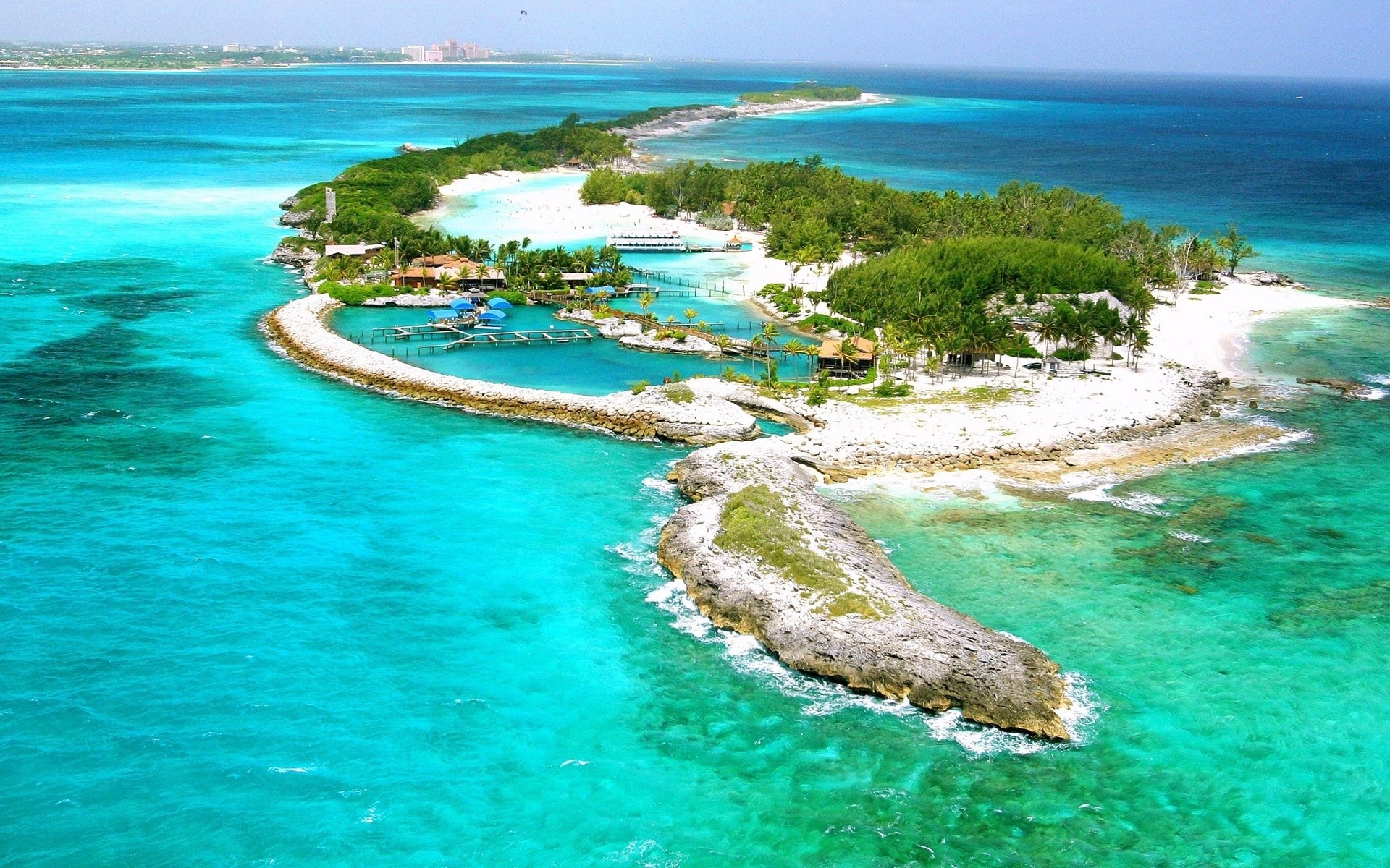 Island resort with turquoise water and white sand beaches HD Wallpaper