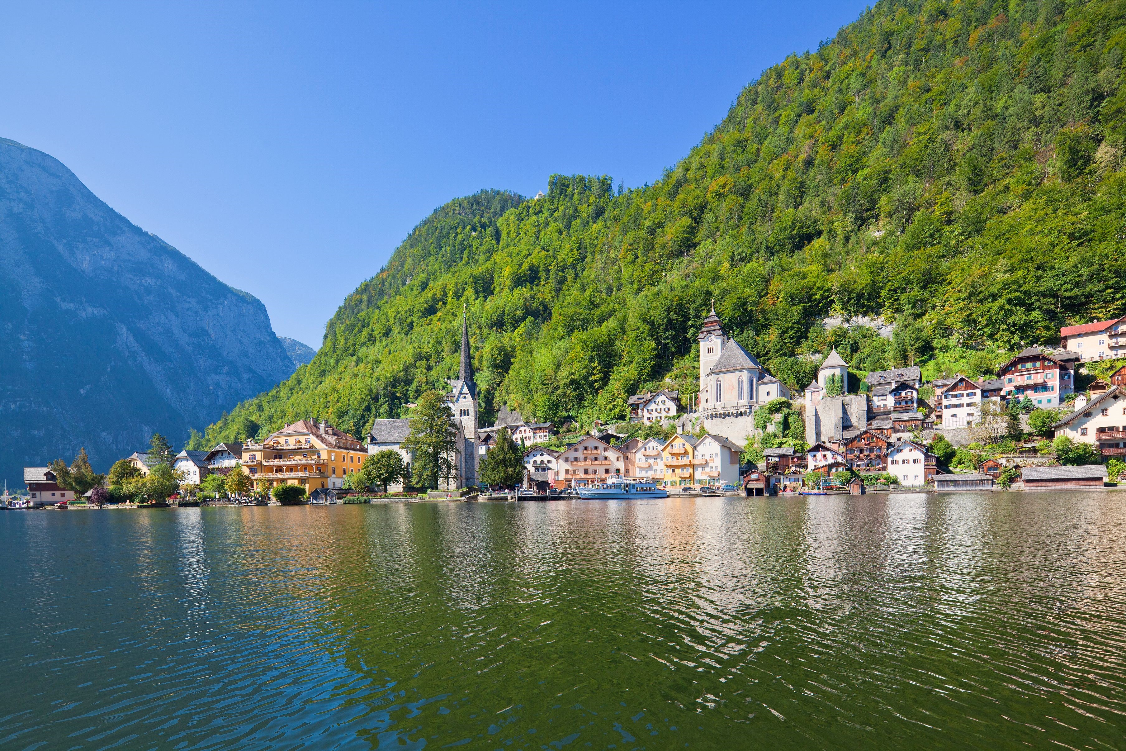 Hallstatt, Austria village on a lake with mountains HD Wallpaper