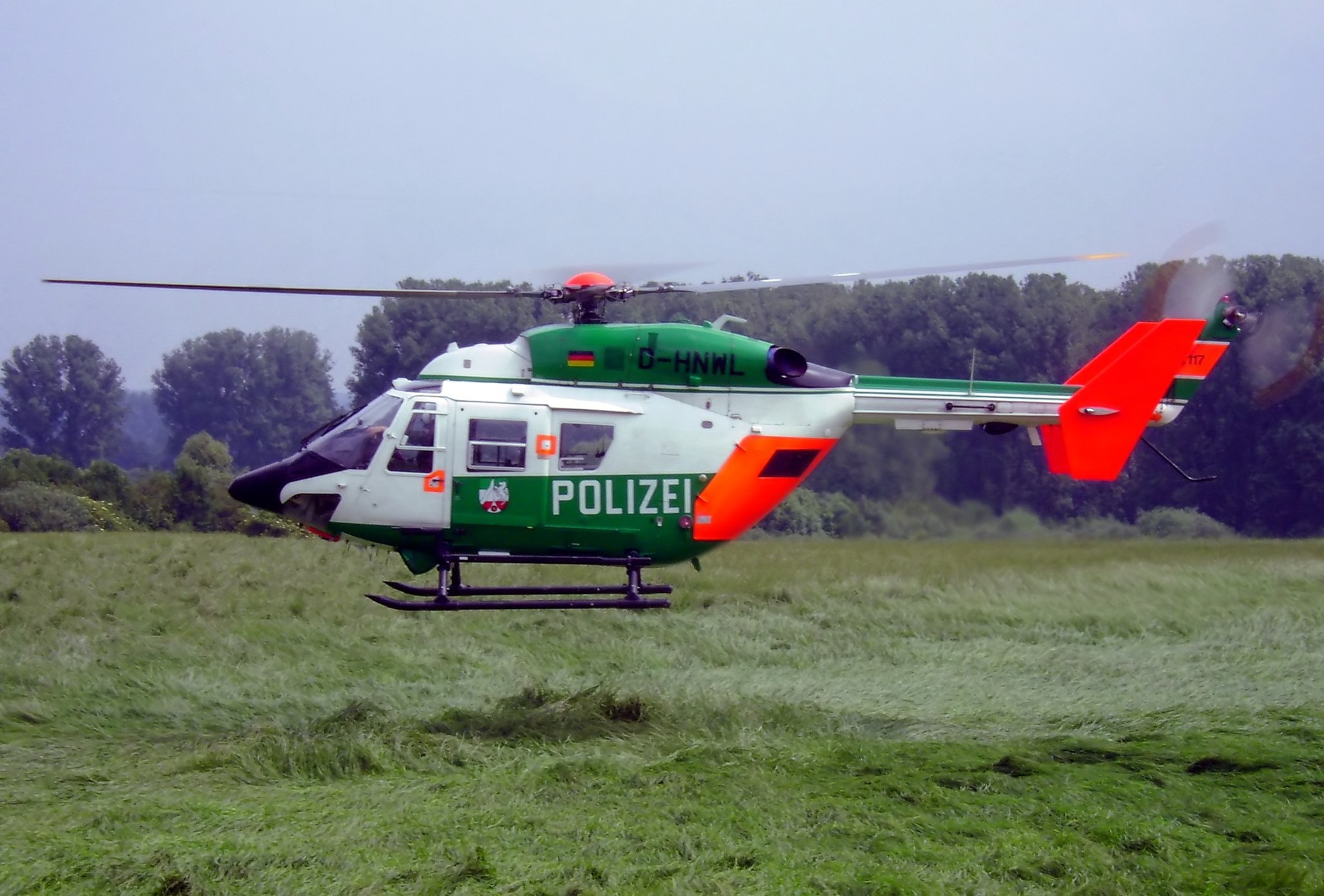 German Police BK-117 Helicopter in Flight HD Wallpaper