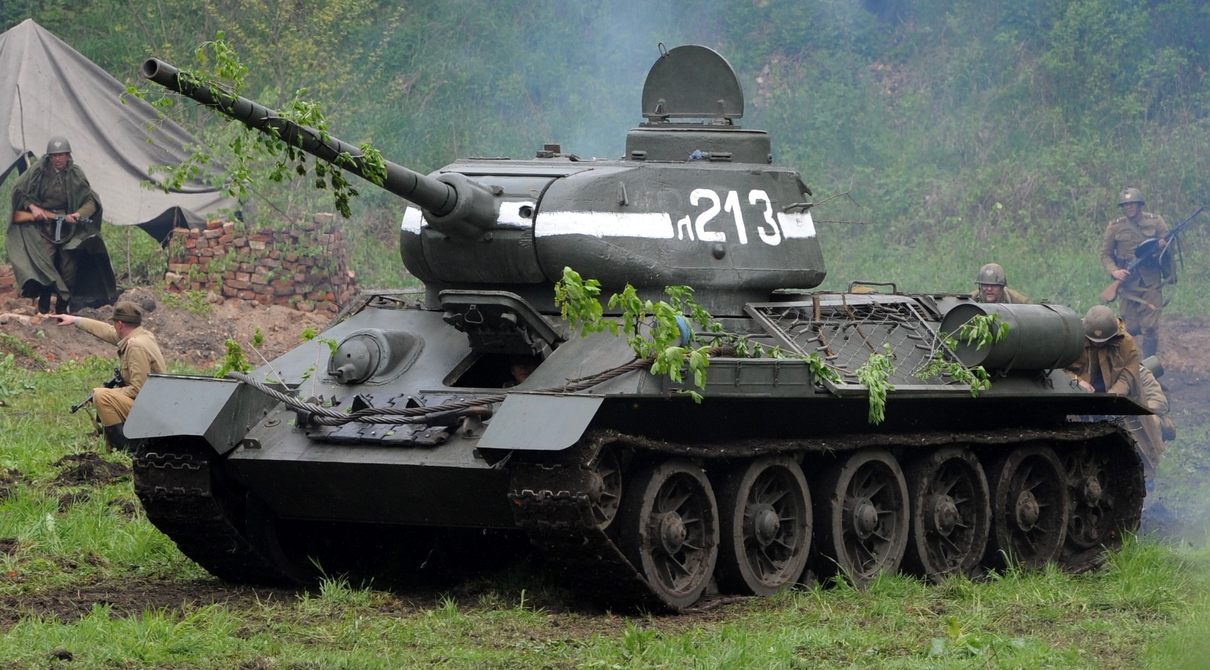 T-34 tank with soldiers in a field HD Wallpaper