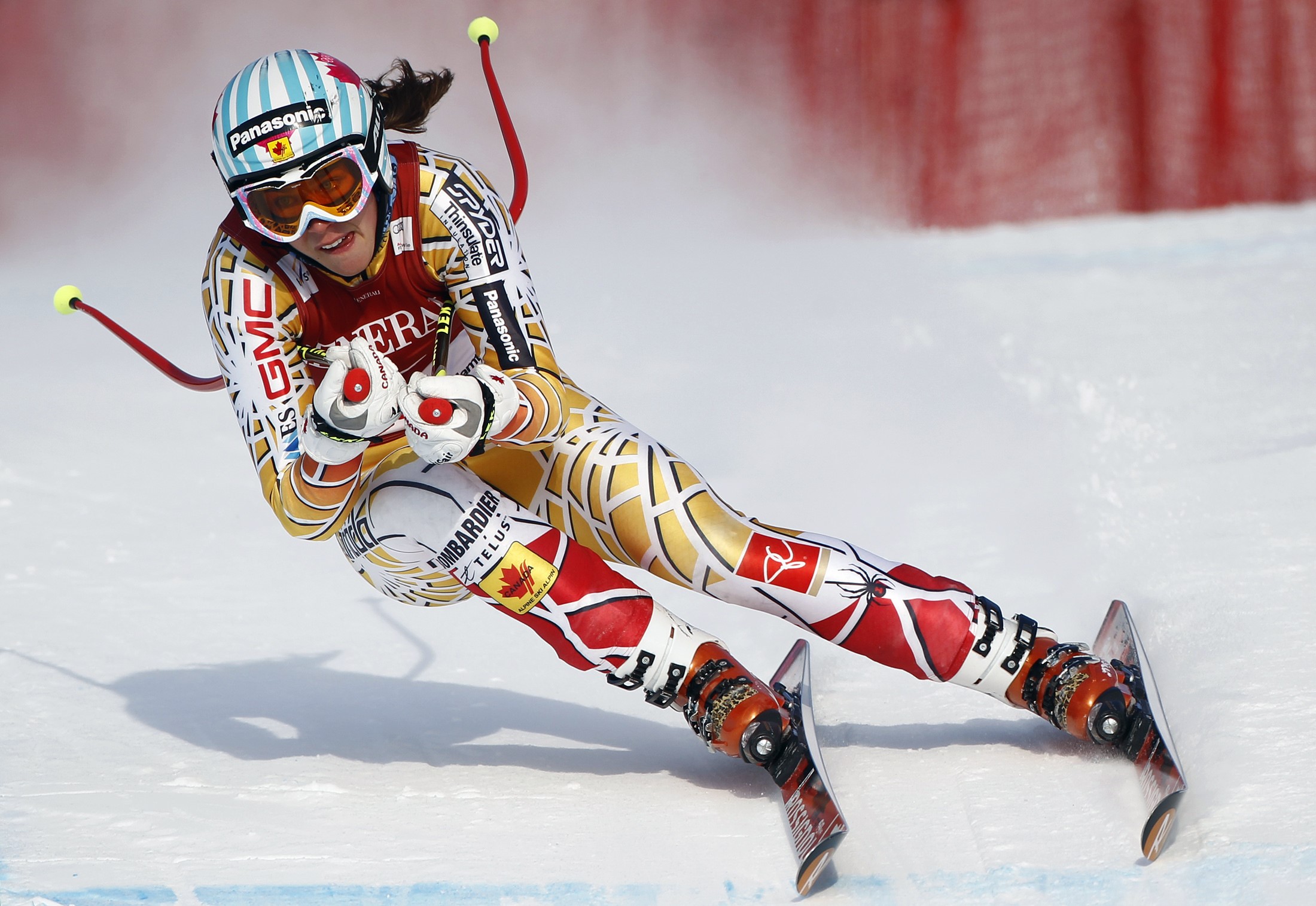 Female skier in Canadian racing suit HD Wallpaper