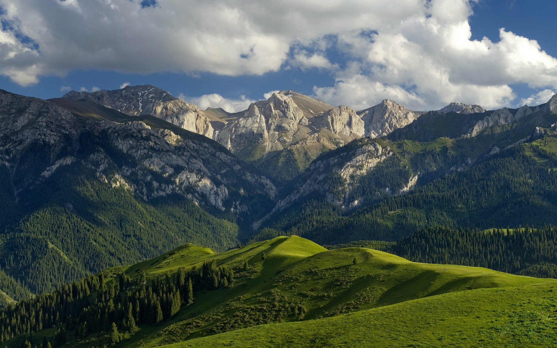 Mountains with green hills and clouds HD Wallpaper