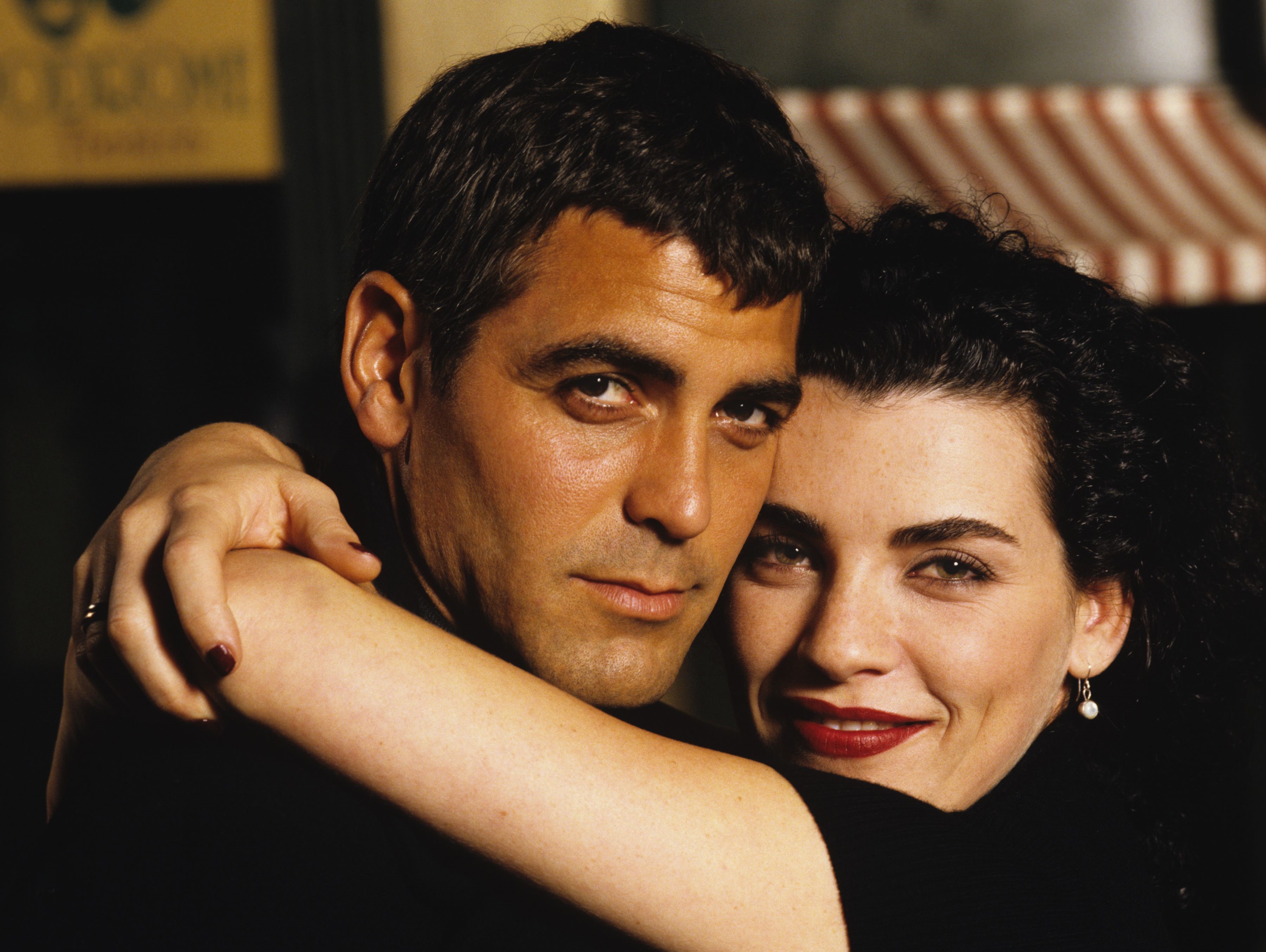 George Clooney and a woman HD Wallpaper