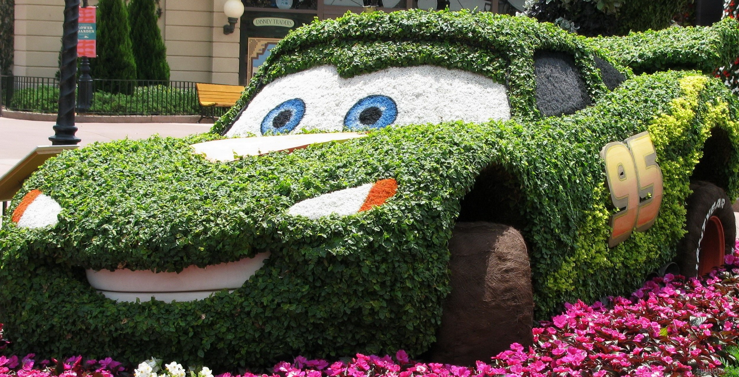 Lightning McQueen topiary from Cars at a park HD Wallpaper
