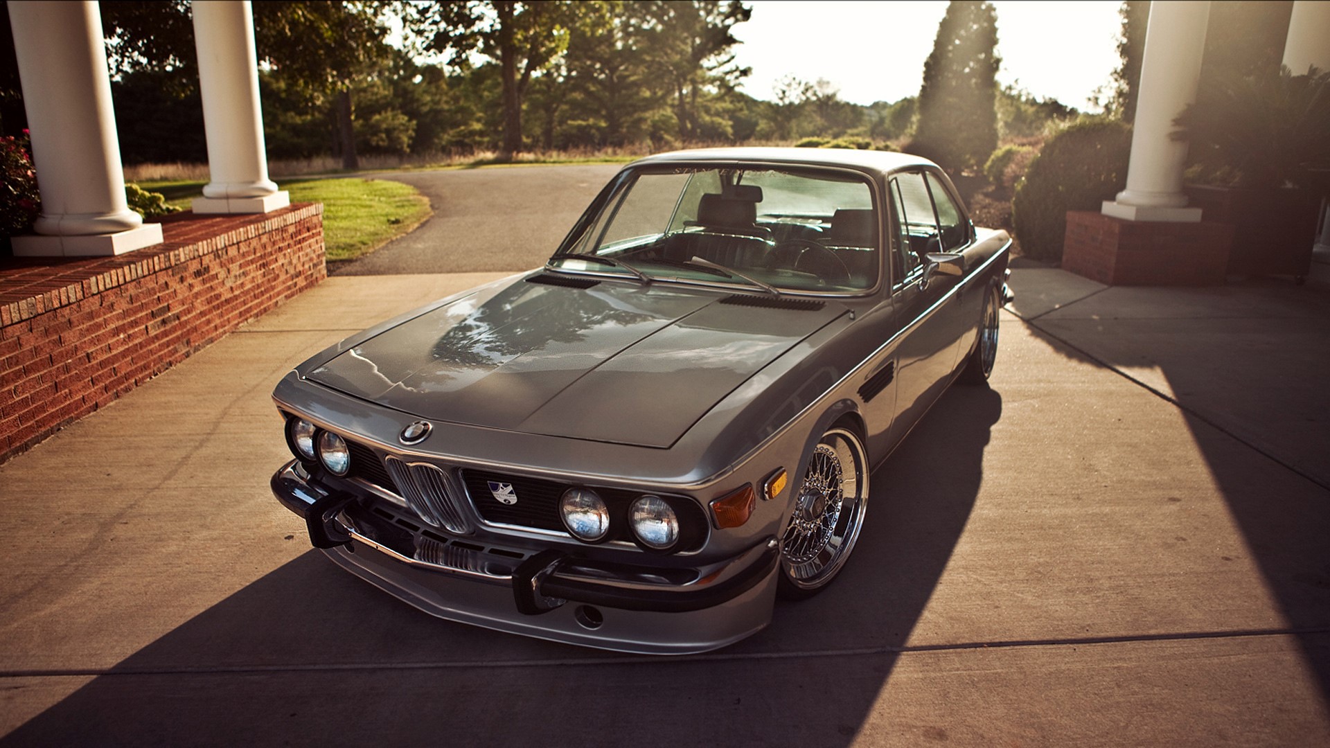 Classic BMW coupe parked in front of a house HD Wallpaper
