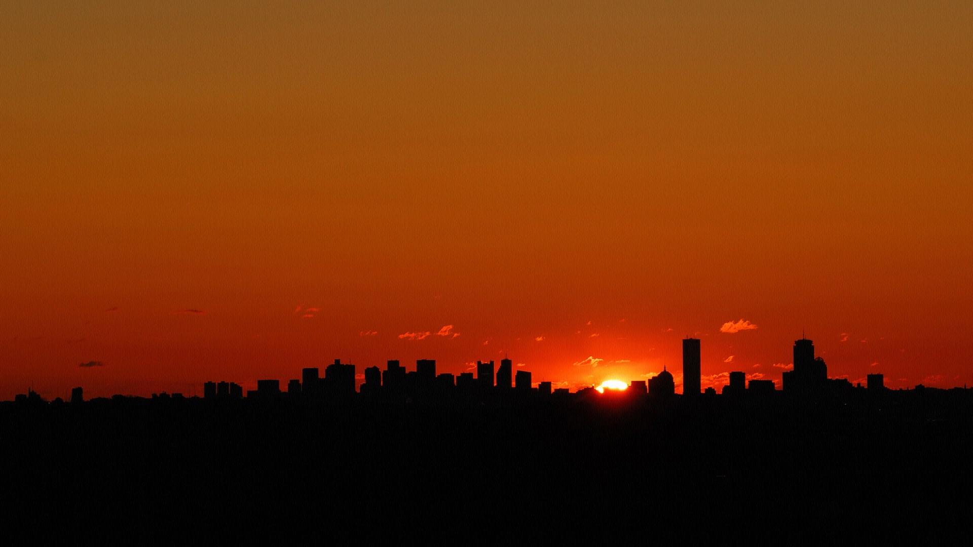 City skyline silhouette at sunset HD Wallpaper