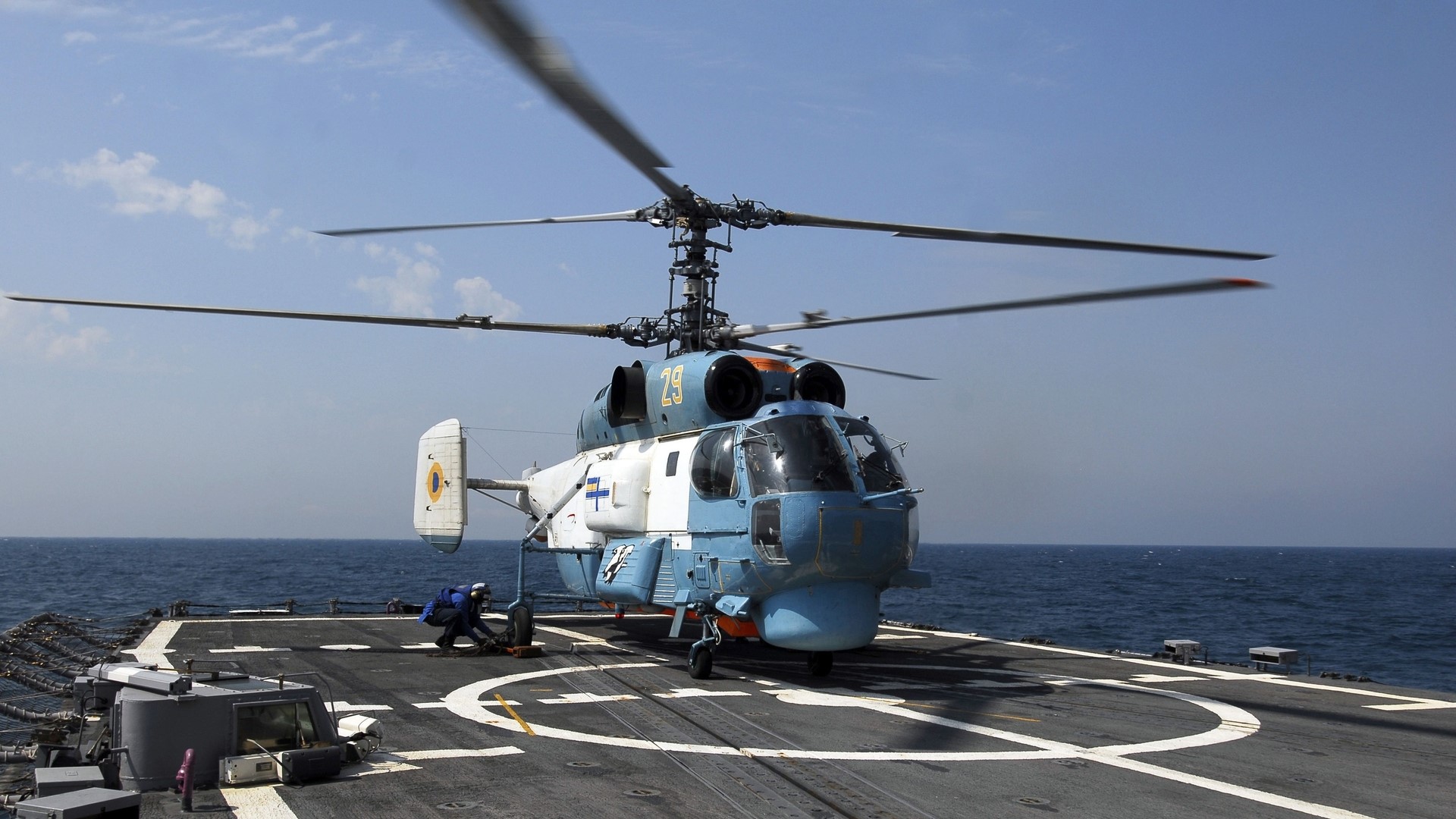 Helicopter on a ship deck HD Wallpaper