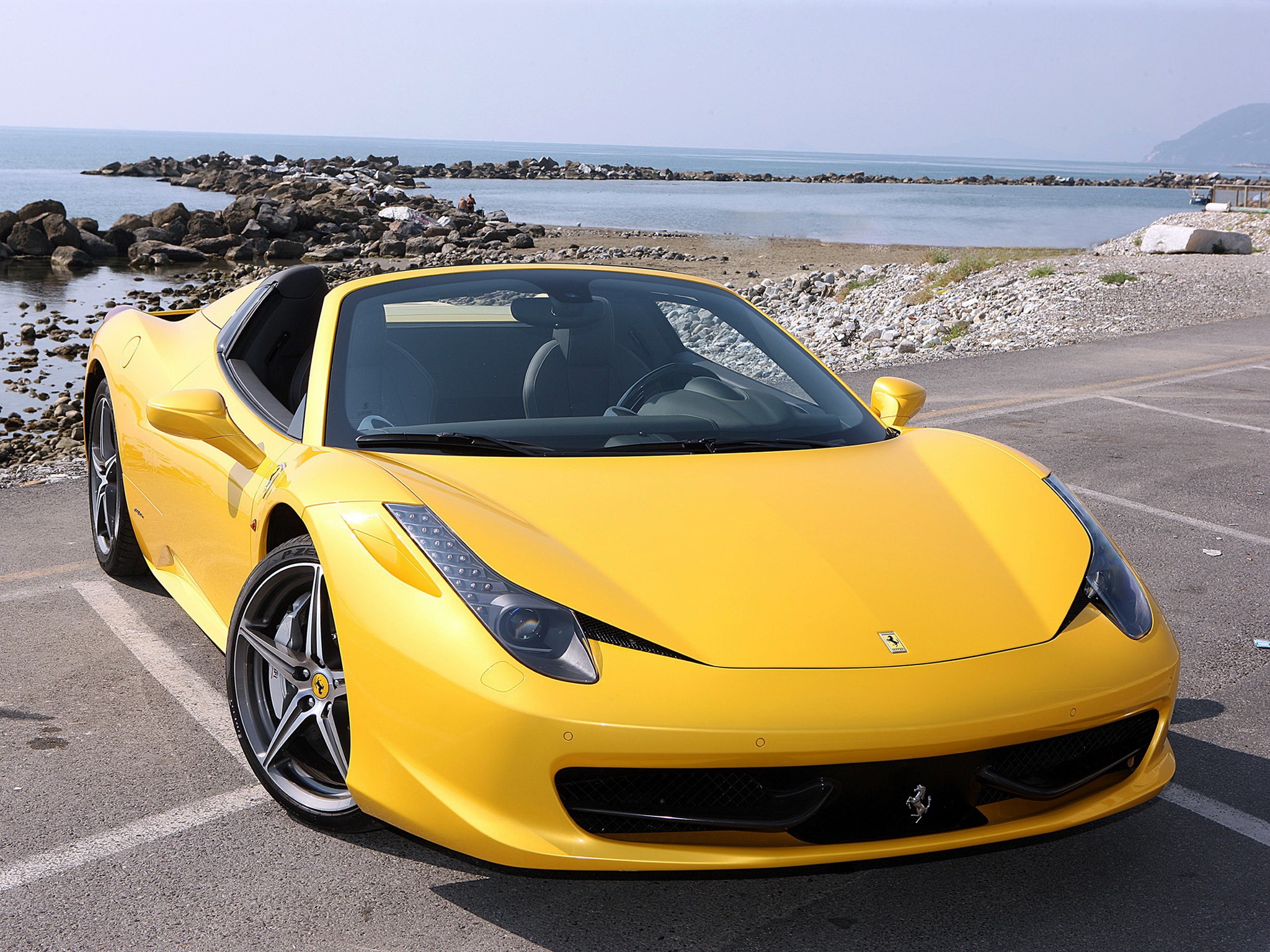 Yellow Ferrari 458 Spider parked by the sea HD Wallpaper