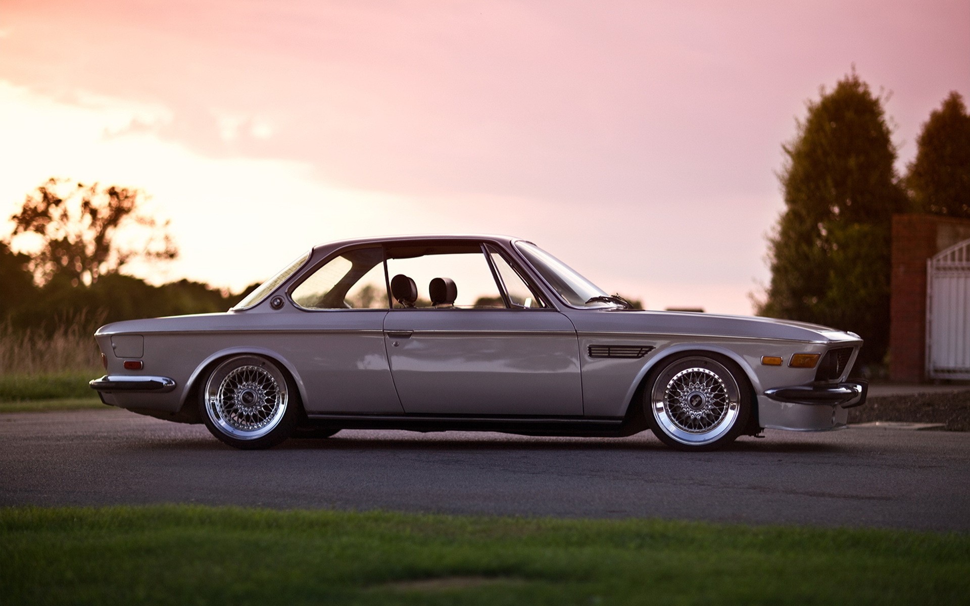 Silver BMW E9 Coupe parked on a road at sunset HD Wallpaper