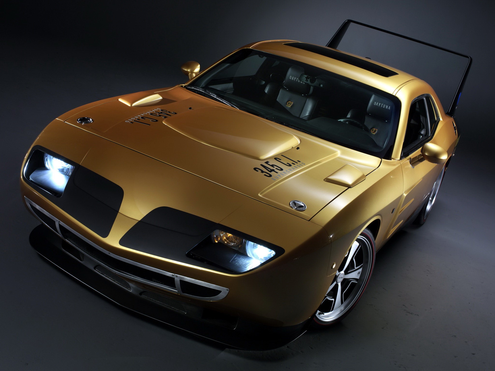 Gold Plymouth Daytona with racing stripes HD Wallpaper