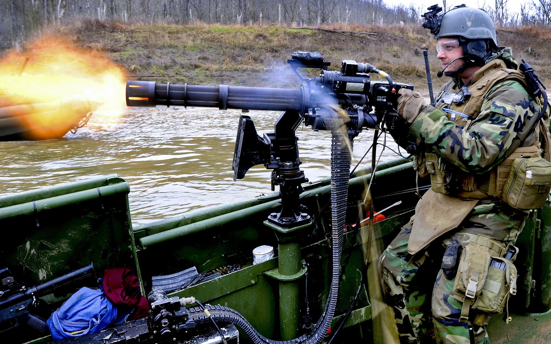 Soldier firing a Gatling gun from a boat HD Wallpaper