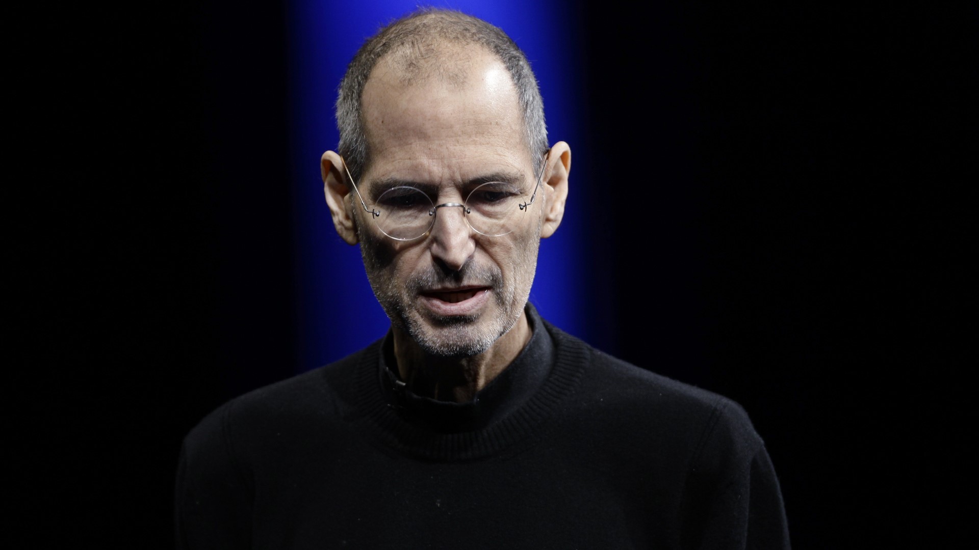 Steve Jobs wearing glasses and a black sweater HD Wallpaper