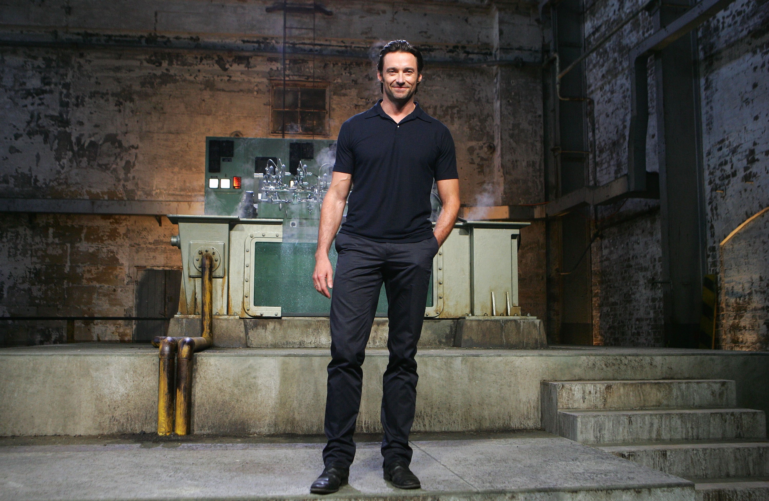 Hugh Jackman in industrial setting HD Wallpaper
