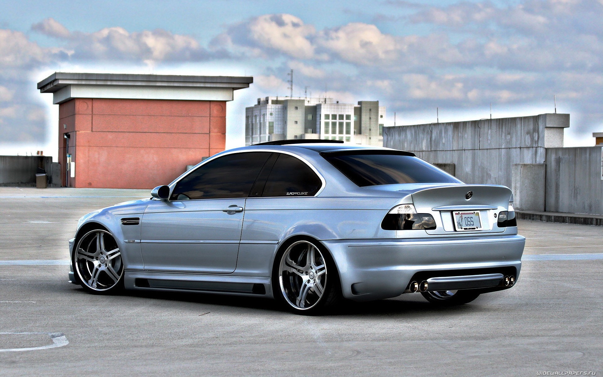 Silver BMW M3 Coupe on Rooftop Parking HD Wallpaper