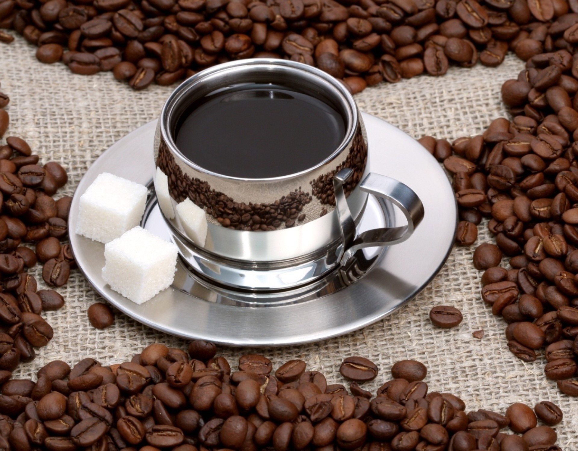 Cup of coffee with sugar cubes and coffee beans HD Wallpaper