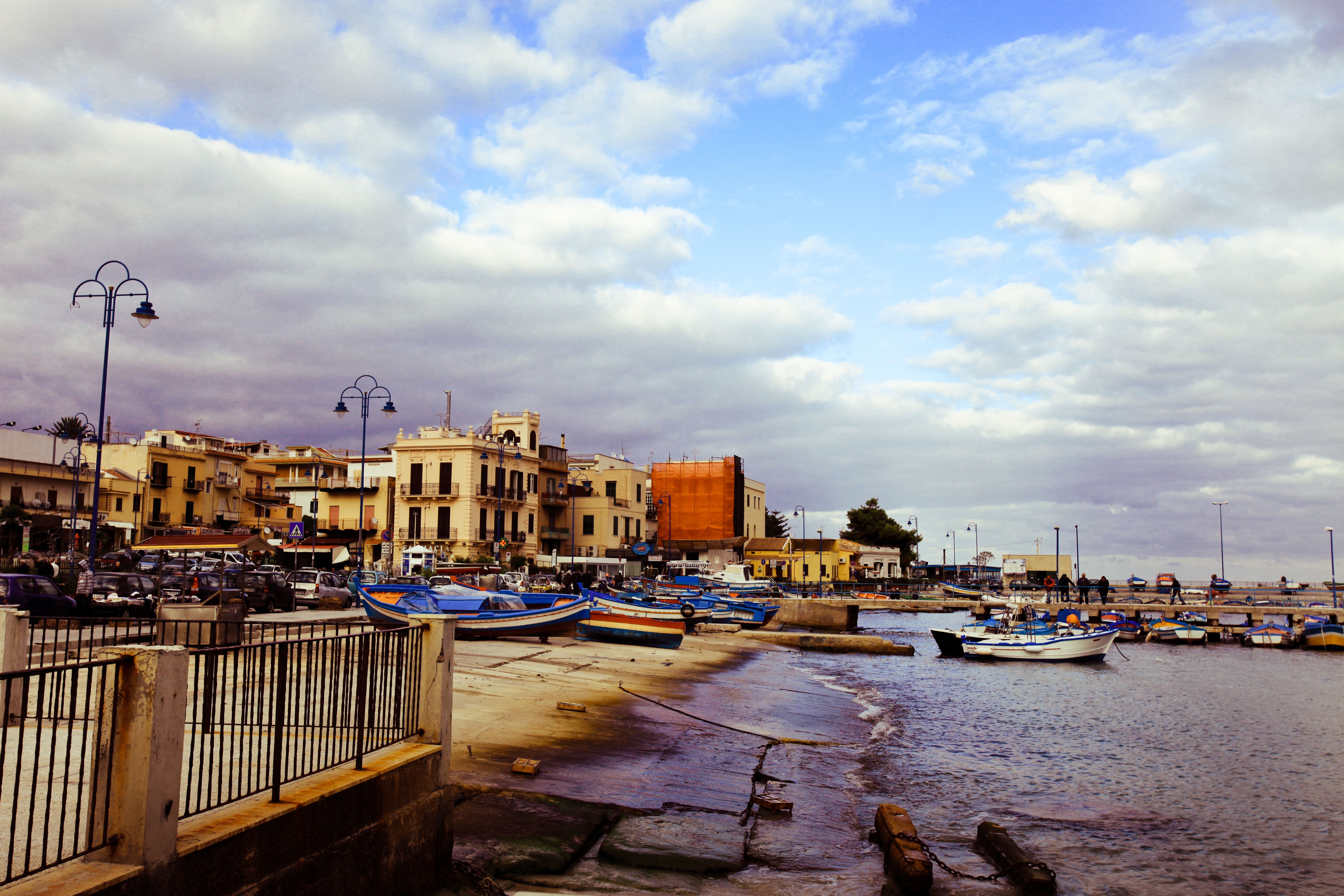 Boats docked in a harbor in Italy HD Wallpaper