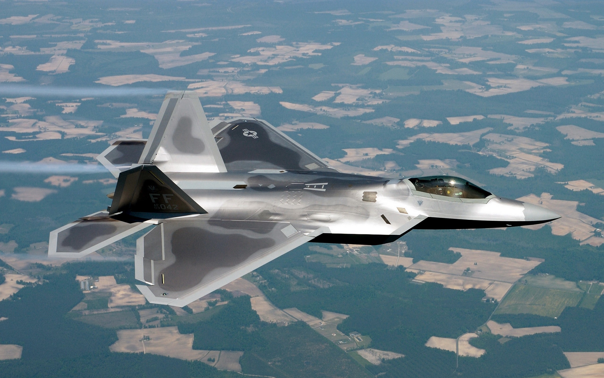 F-22 Raptor fighter jet in flight HD Wallpaper
