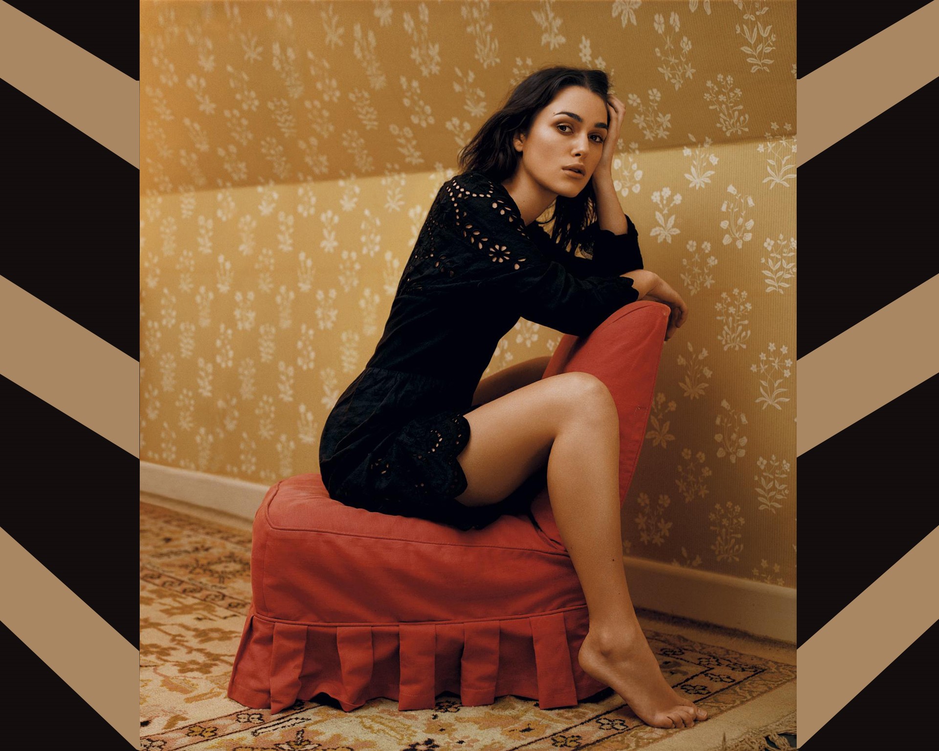 Keira Knightley sitting on a chair HD Wallpaper